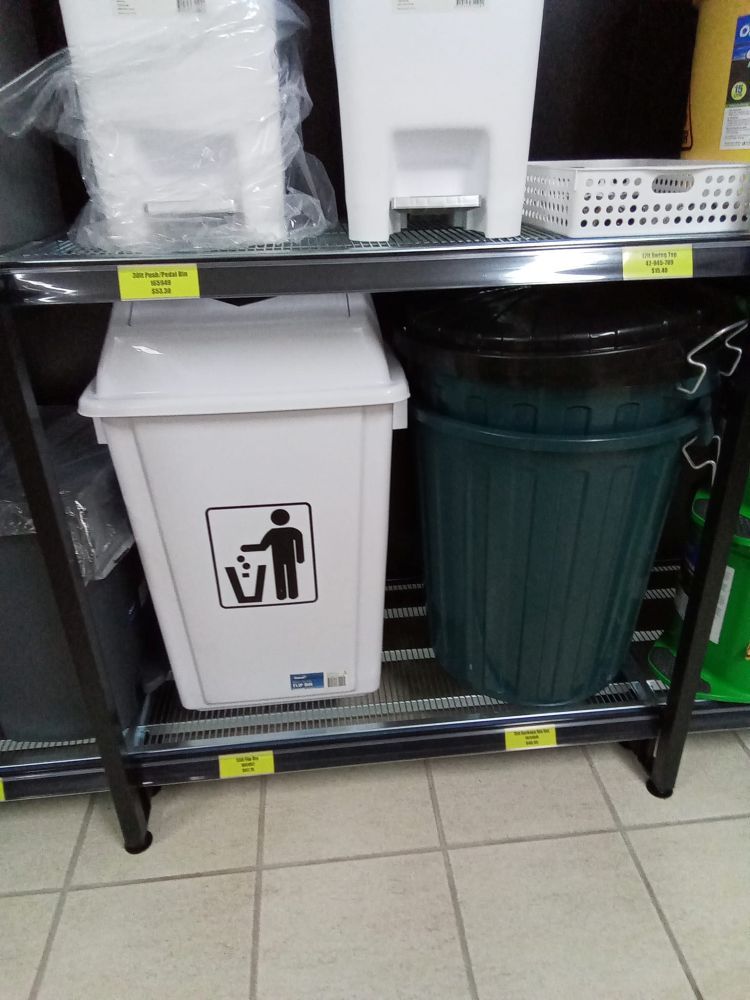Two Trash Cans Are On A Shelf In A Store — A1 Cleaner Carpets N Homecare In Ravenshoe, QLD