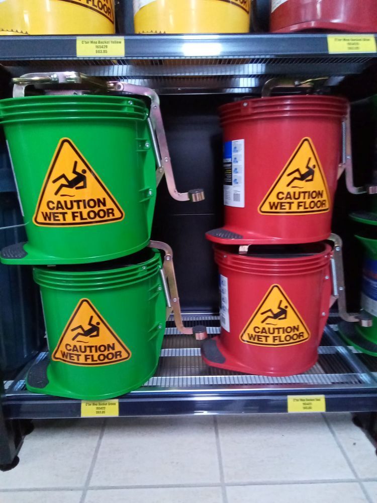 Caution Wet Floor Buckets Are Stacked On Top Of Each Other — A1 Cleaner Carpets N Homecare In Mareeba, QLD