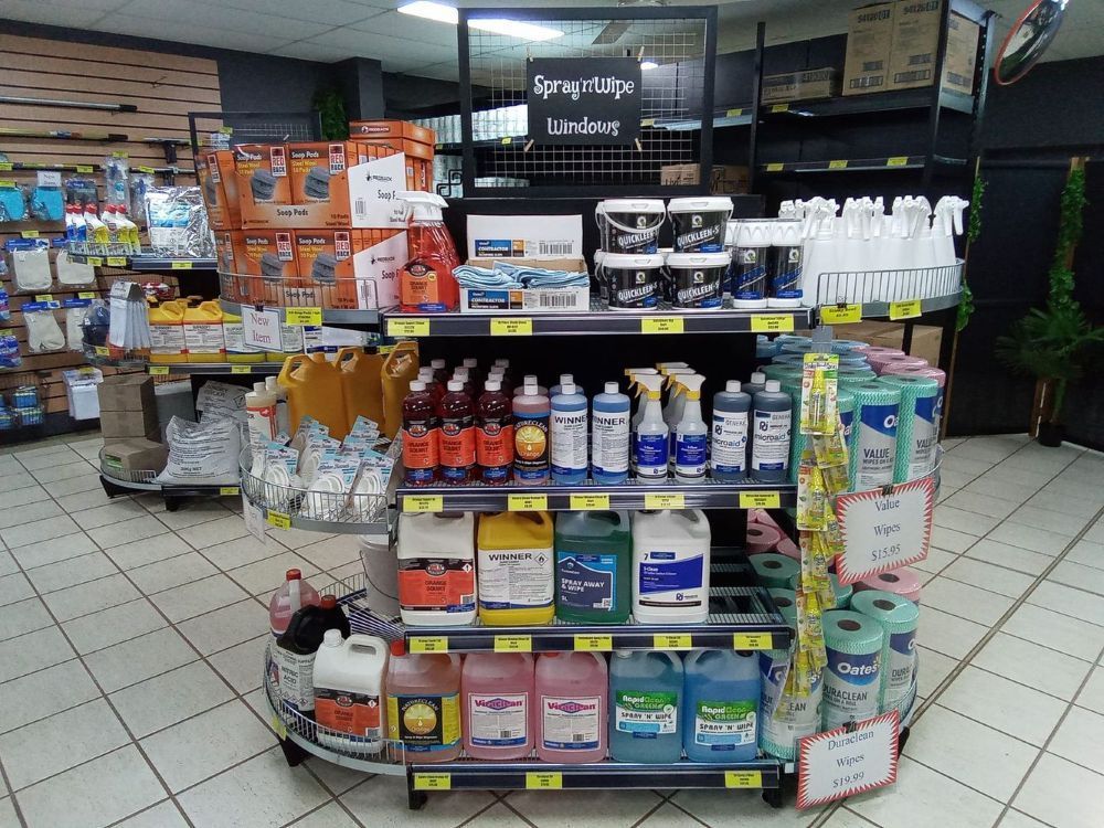 Store Cashier Surrounded By Cleaning Products — A1 Cleaner Carpets N Homecare In Atherton, QLD