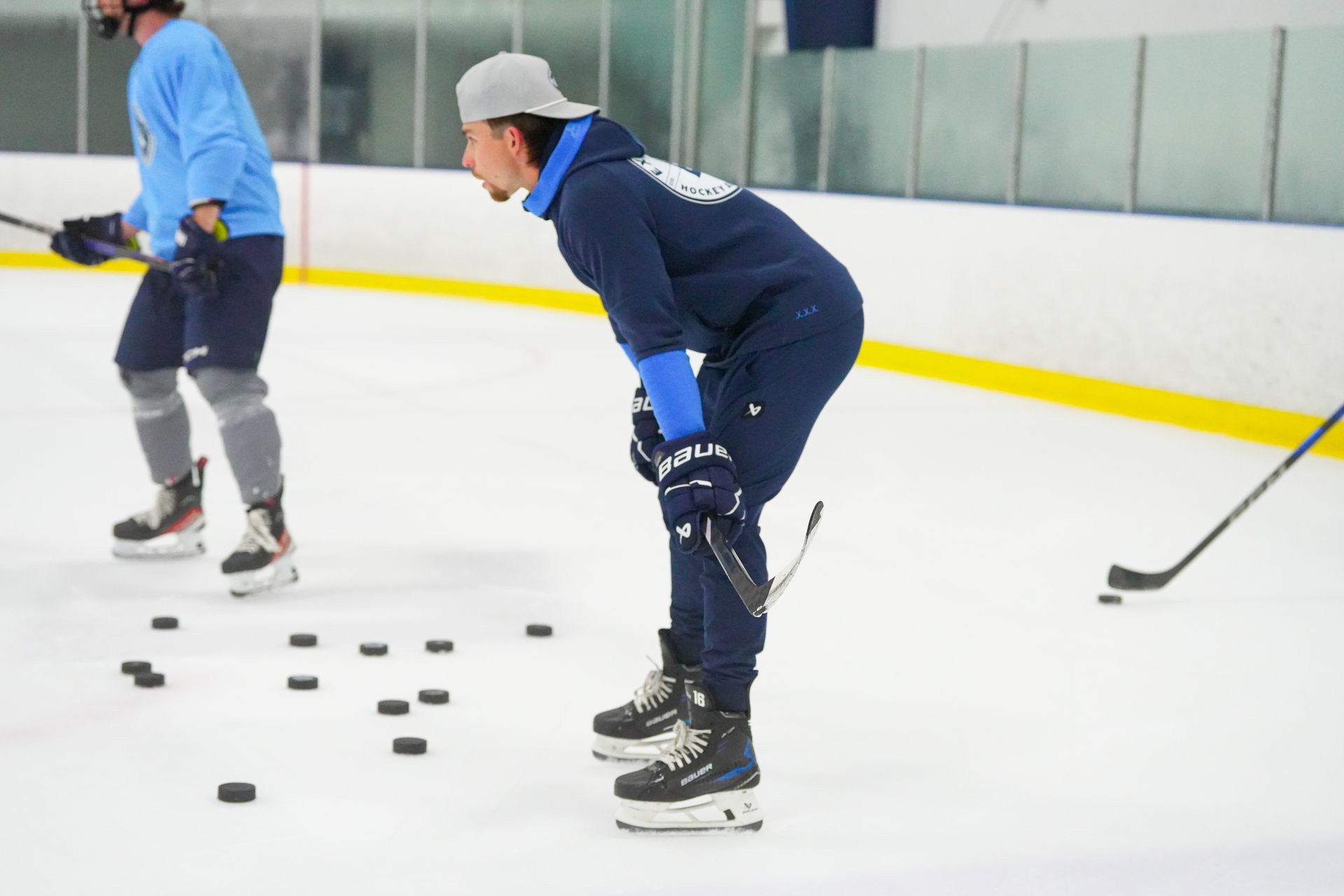 Coach Cole intently running a session.