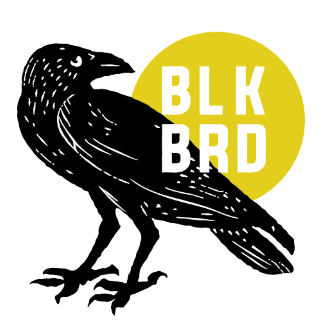 A black bird is standing next to a yellow circle that says blk brd