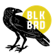 A black bird is standing next to a yellow circle that says blk brd