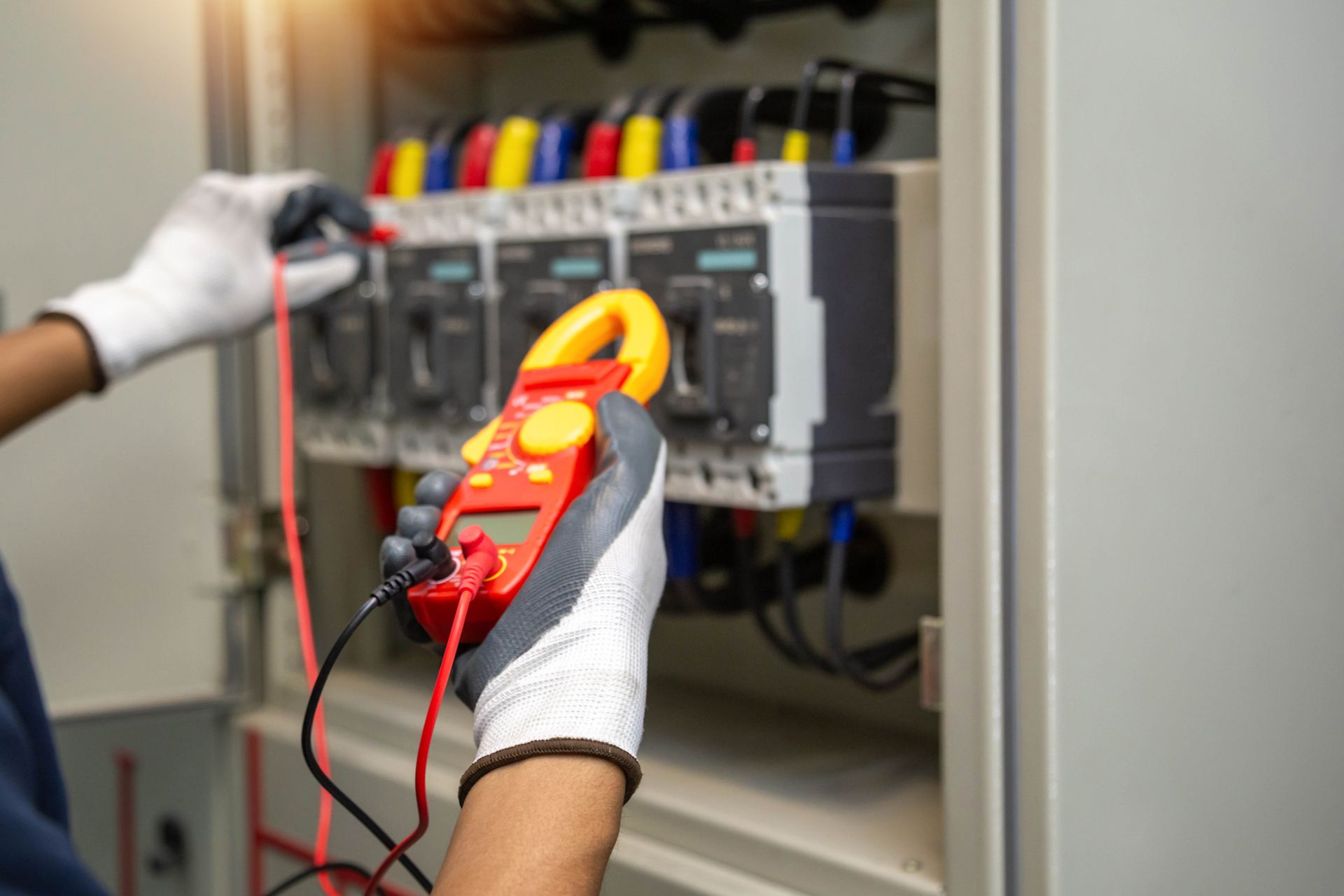 Licensed electrician performing Electrical Contractor Services on a residential panel. Licensed electrician performing Electrical Contractor Services on a residential panel.