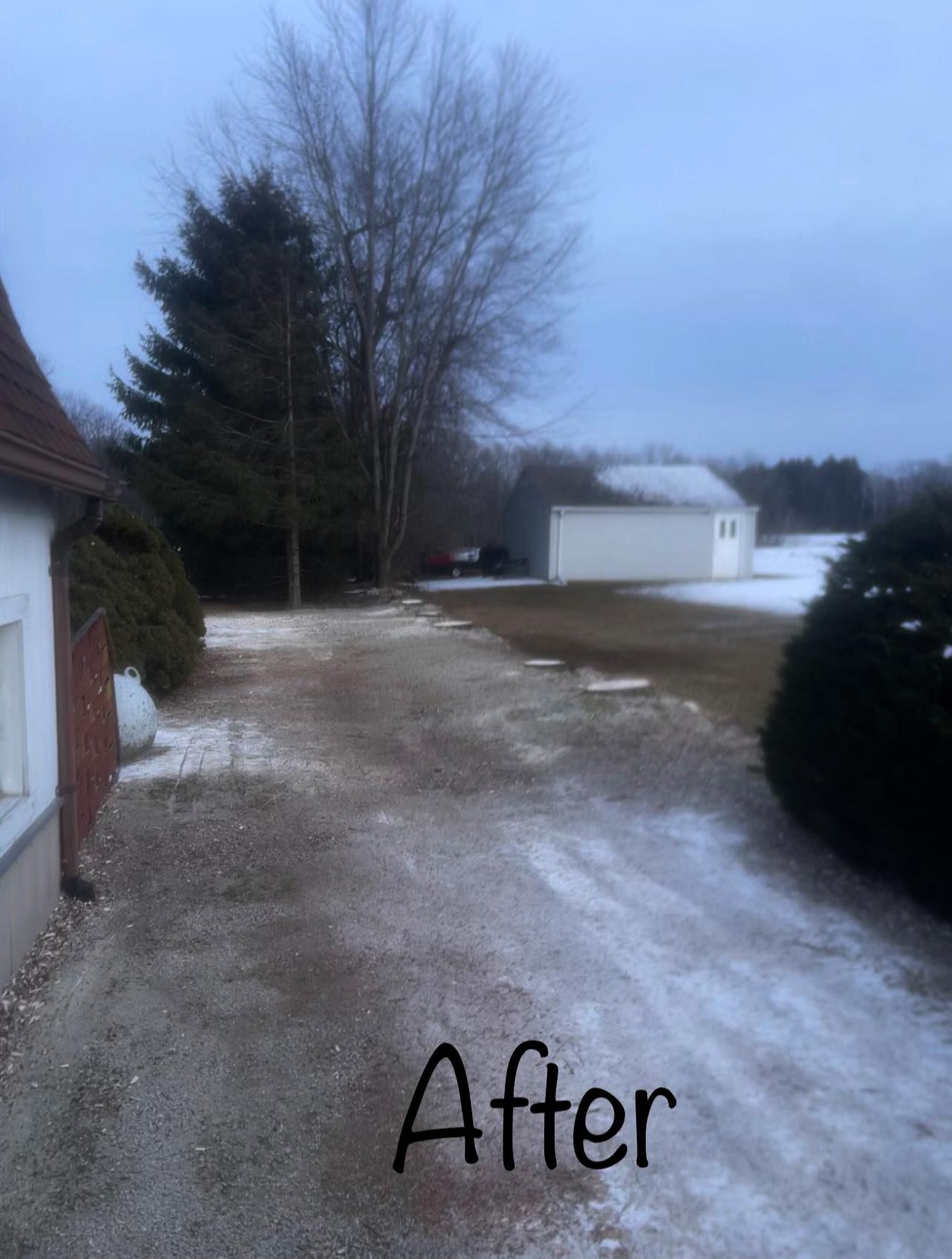 Snow-dusted gravel driveway leading to a white garage and trees, labeled “After”