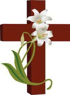A cross with two white lilies on it.
