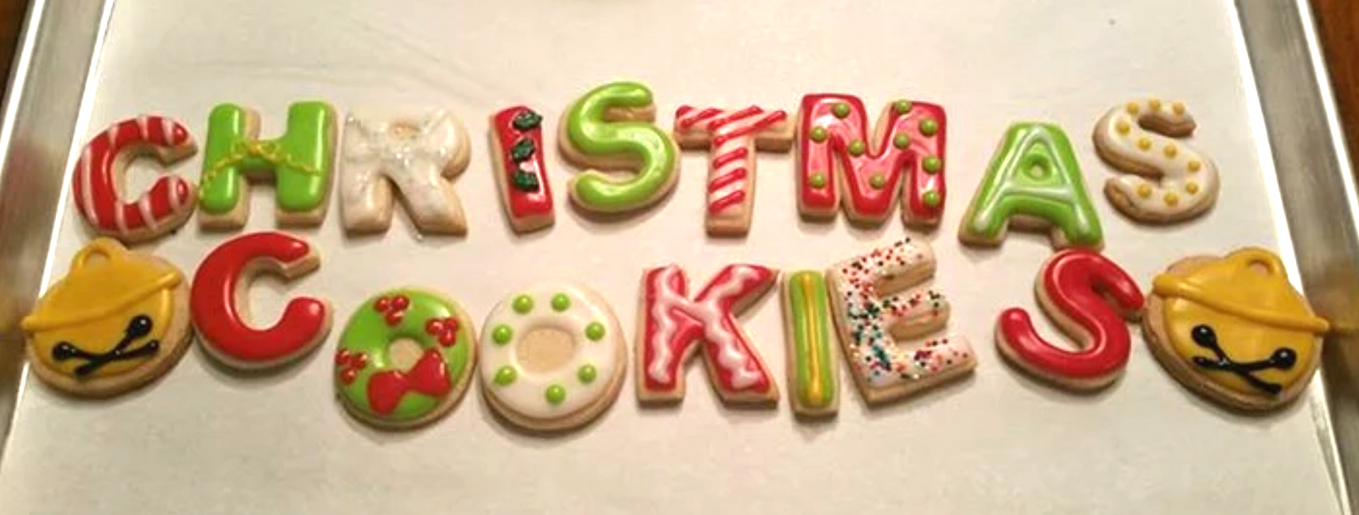 Christmas cookies in the shape of letters spelling