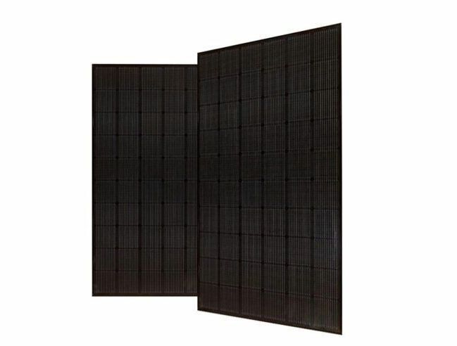 Two black solar panels are sitting next to each other on a white background.
