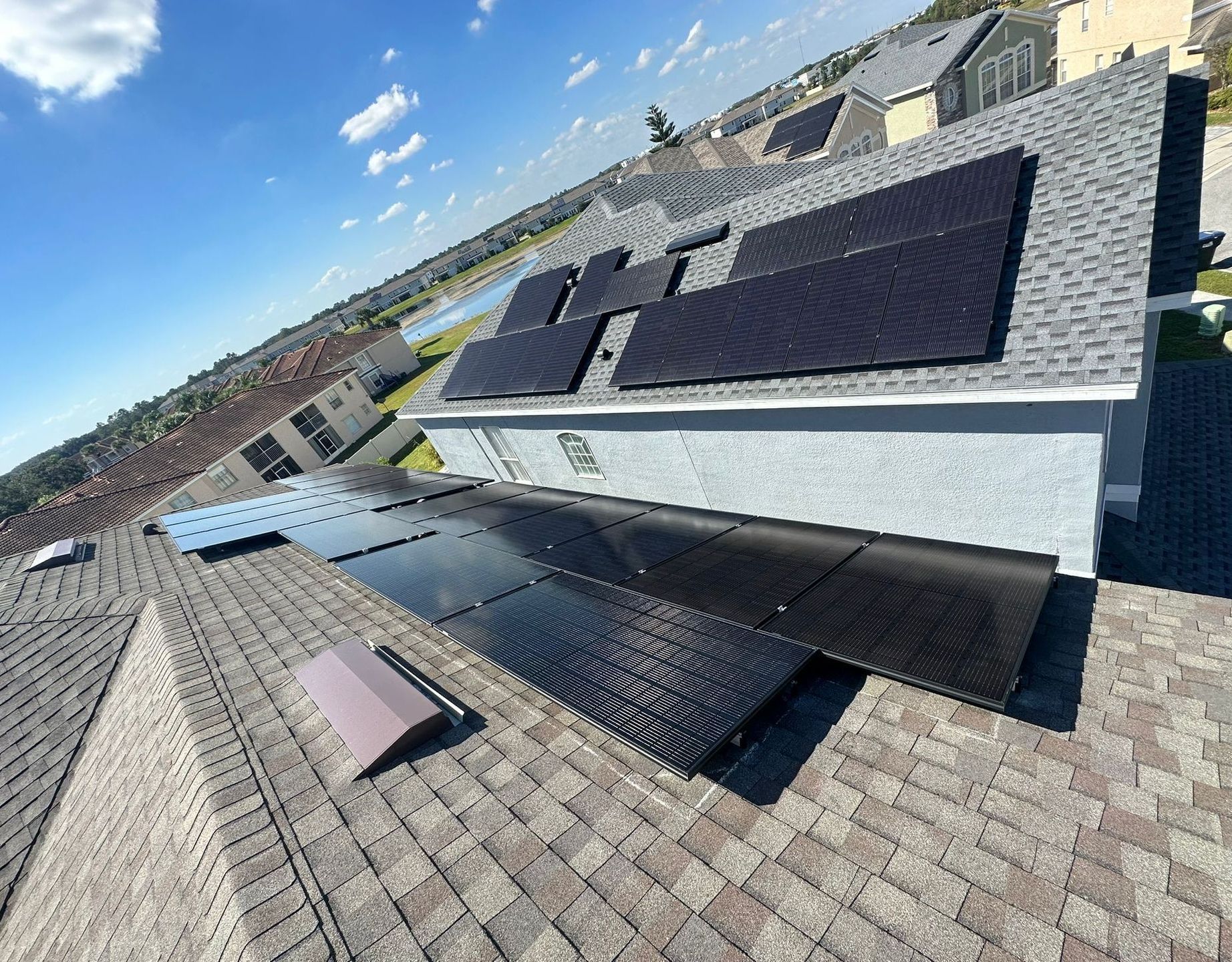 A roof with a lot of solar panels on it
