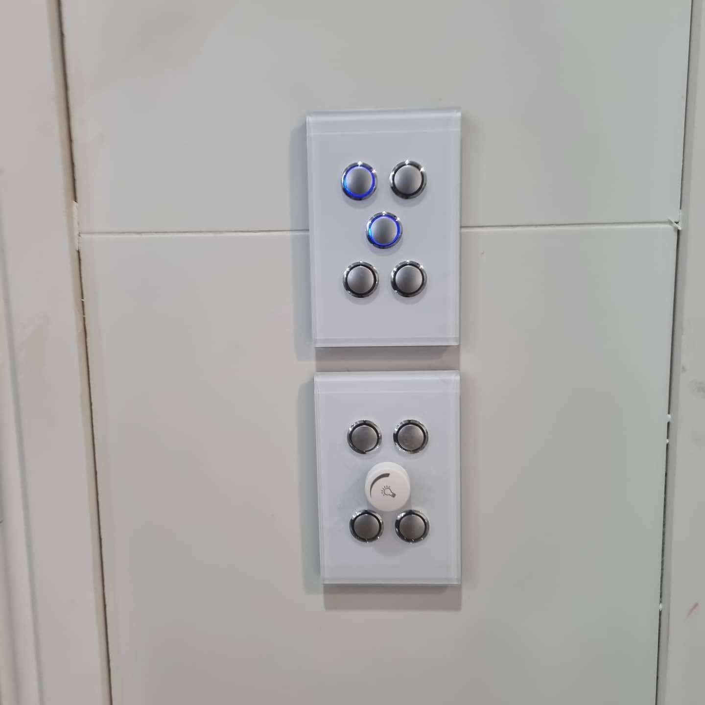 A Close Up Of a Light Switch on A White Wall — Goldspark GC Electrical in Burleigh Waters, QLD