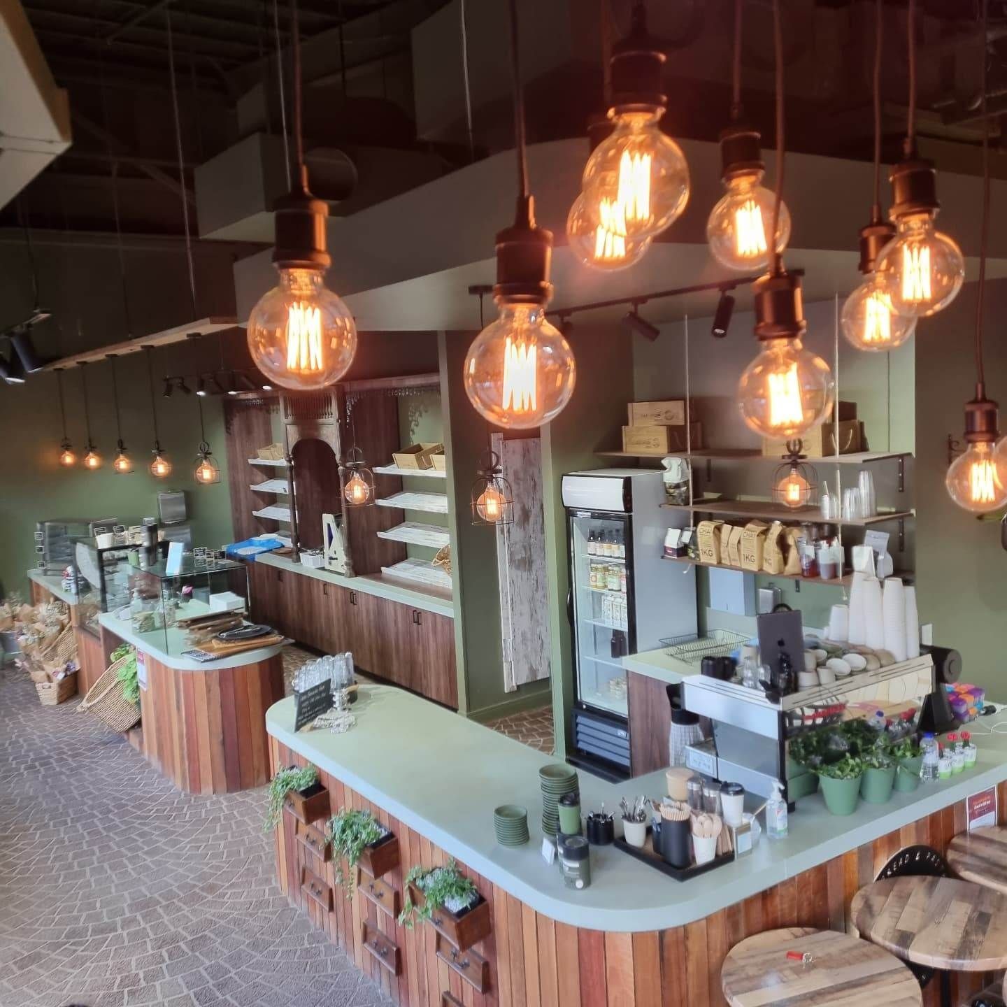 A Restaurant with Lots of Lights Hanging from The Ceiling — Goldspark GC Electrical in Burleigh Waters, QLD