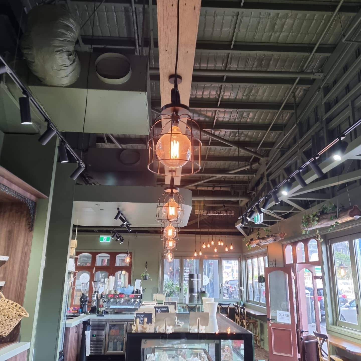 A Bakery with A Lot of Lights Hanging from The Ceiling — Goldspark GC Electrical in Burleigh Waters, QLD