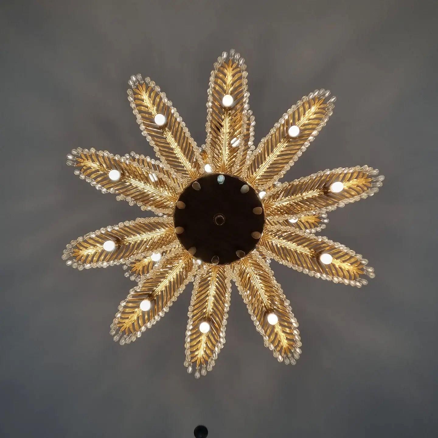 Looking up At a Chandelier that Looks Like a Flower — Goldspark GC Electrical in Burleigh Waters, QLD