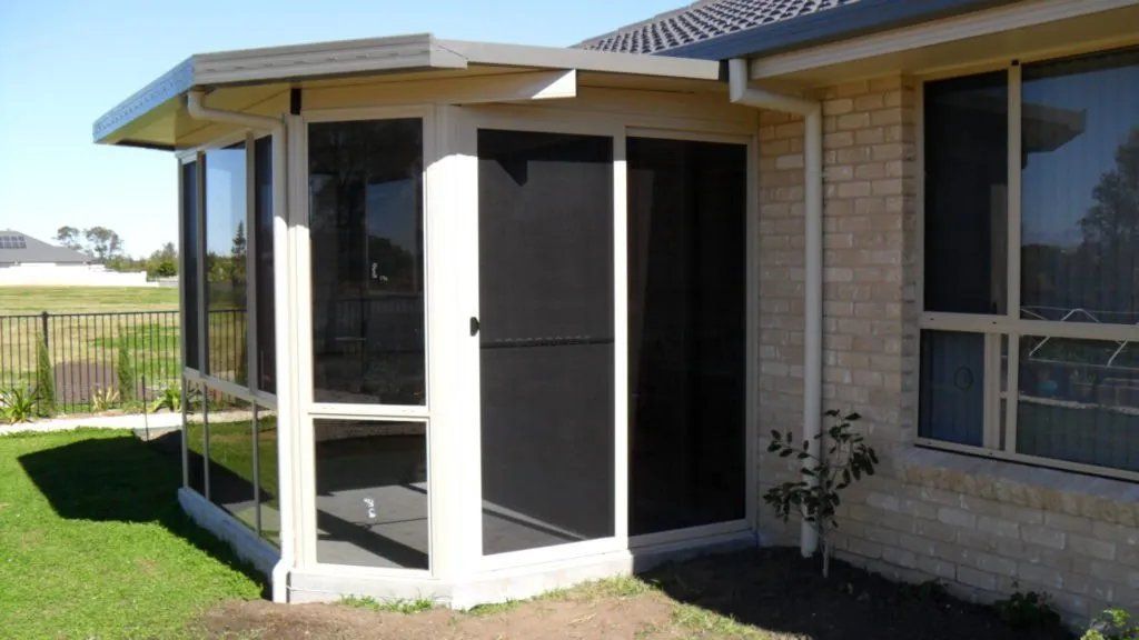 A Screened in Porch on The Side of A House — Manning Valley Patios in Wingham, NSW