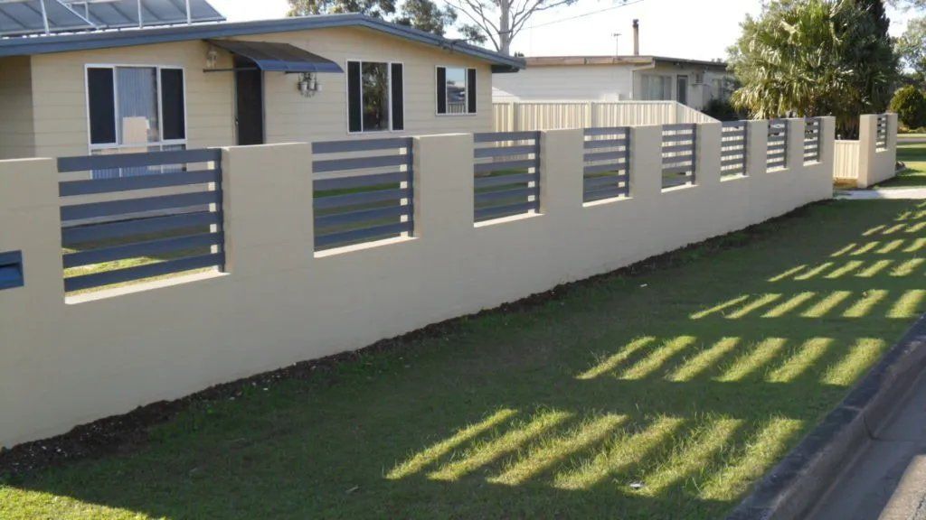 A House with A Fence Along the Side of It — Manning Valley Patios in Cundletown, NSW