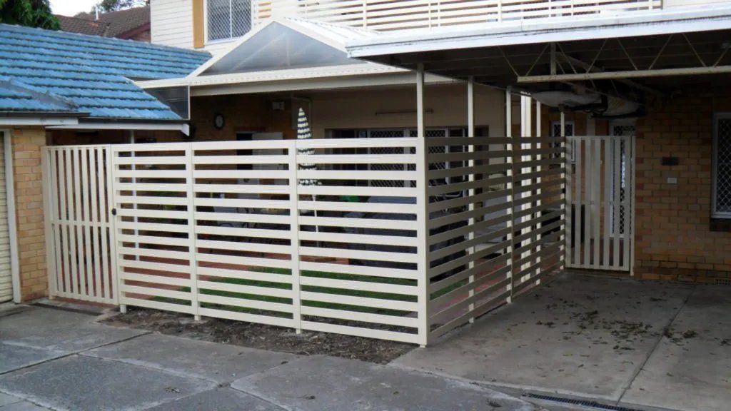 A House with A White Fence in Front of It — Manning Valley Patios in Cundletown, NSW