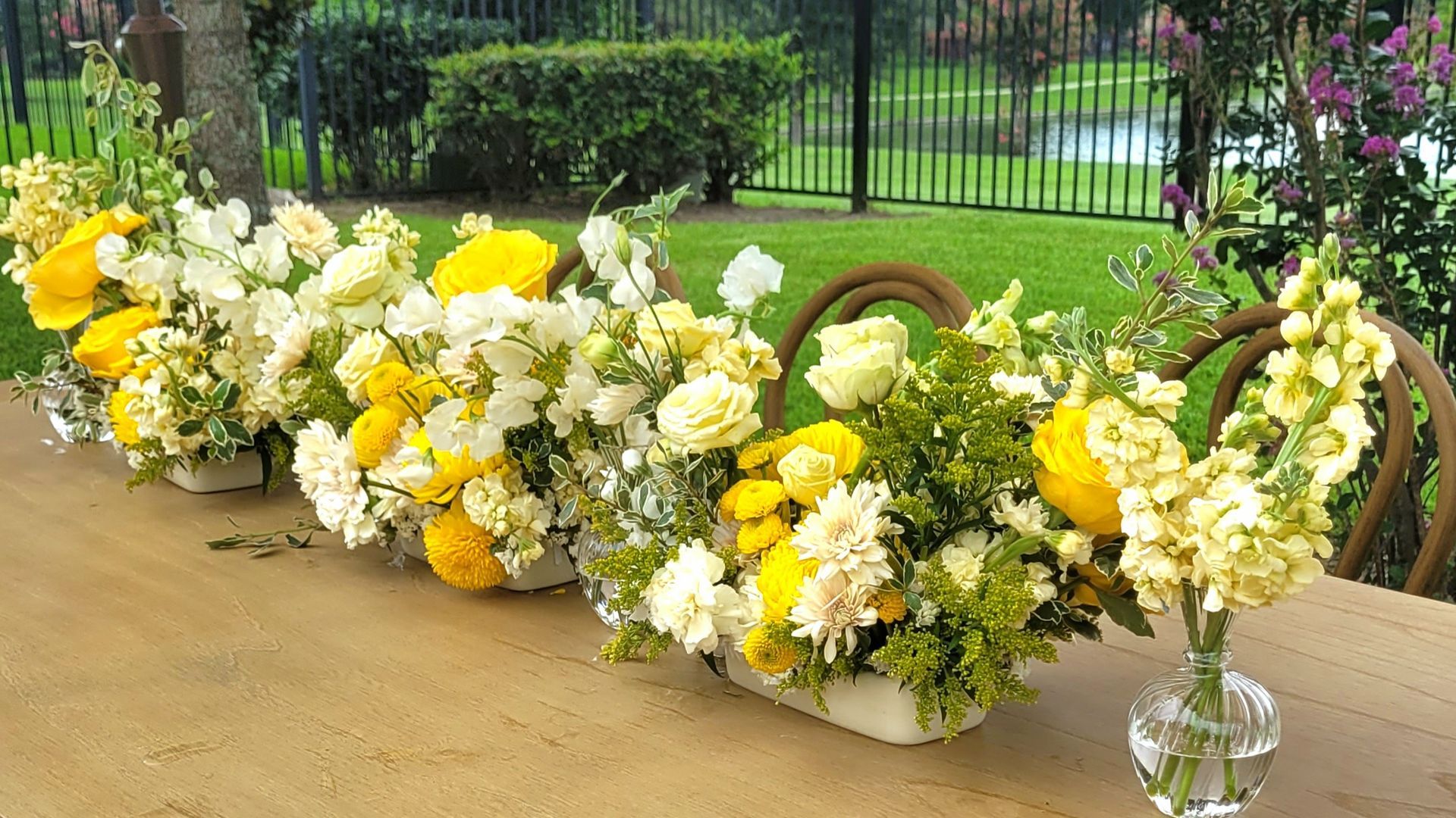 Yellow peony floral centerpieces and arrangements by Event by Ova for a celebration of life event