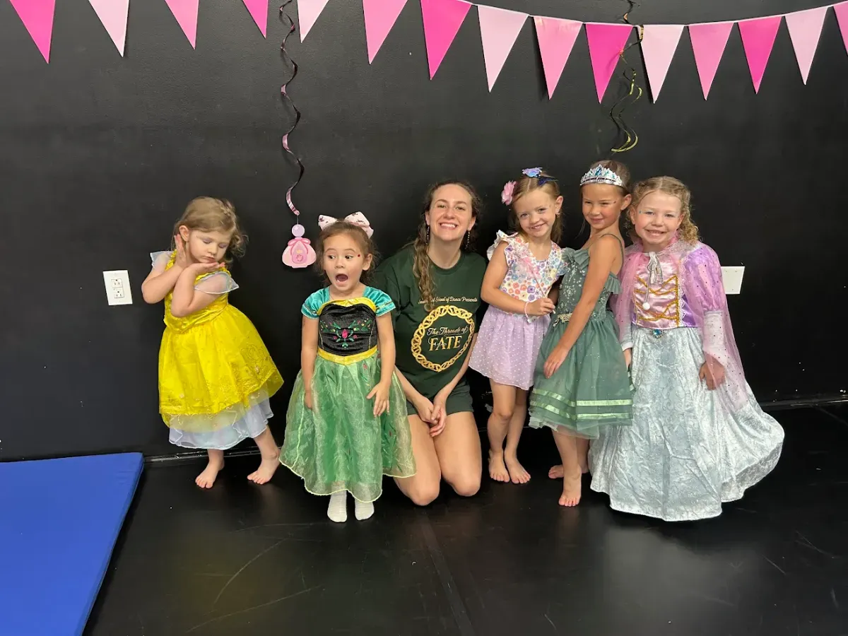 A group photo of student dancers with Ms Sidney at Southeast School of Dance