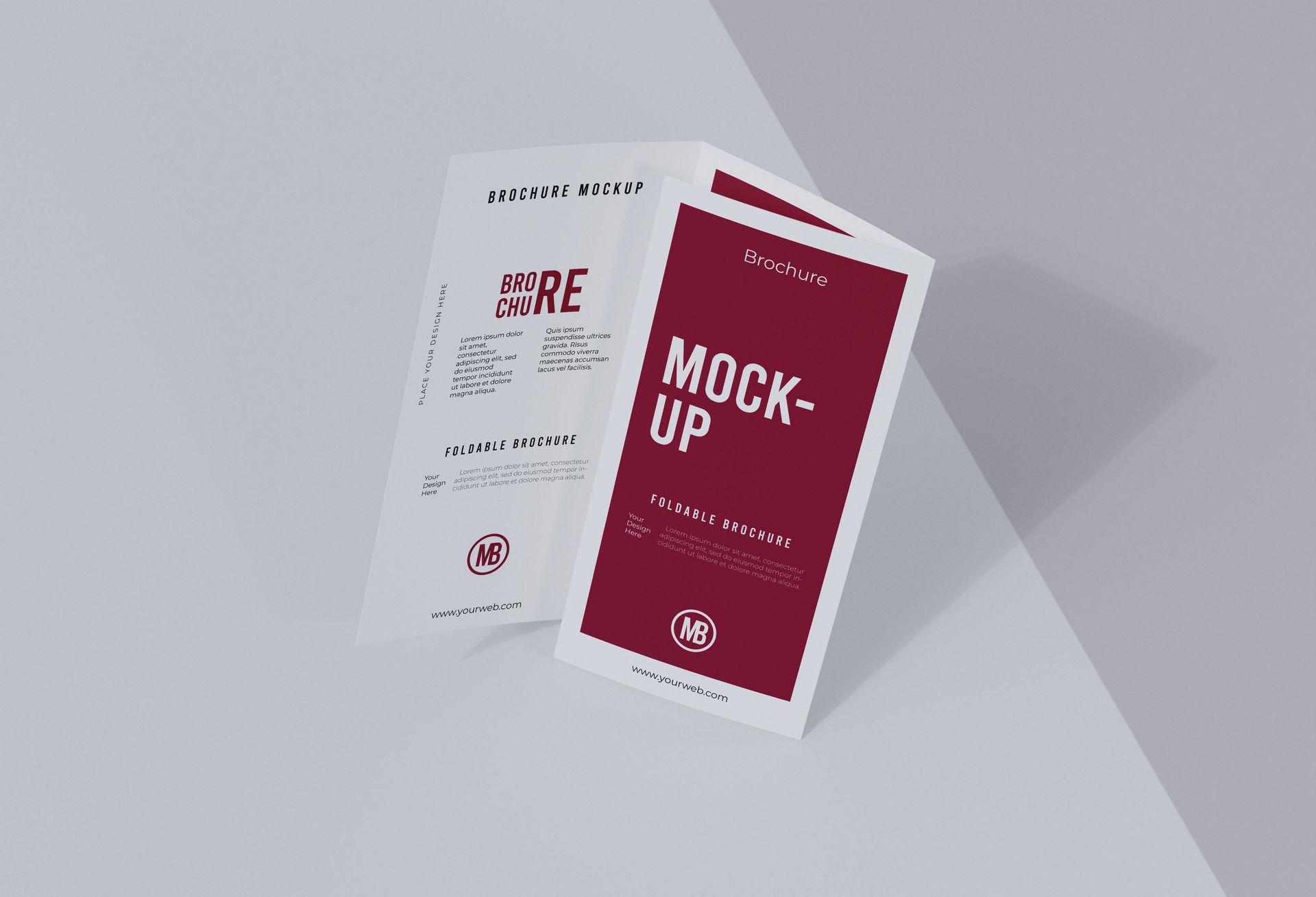 Brochure mockup with burgundy and white panels, angled on a white surface.