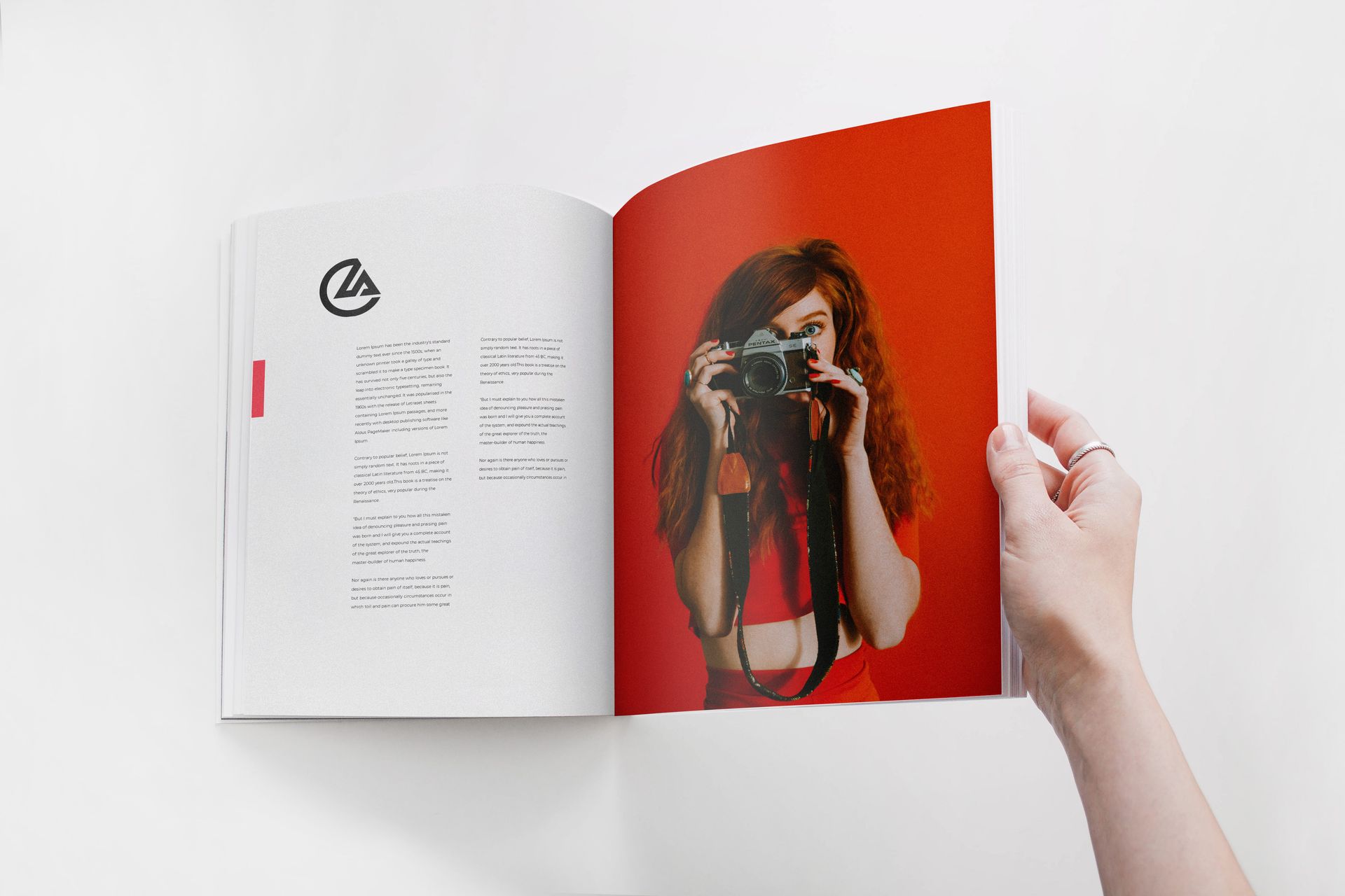 Person holding open a book, left page has text, right page has photo of a woman with a camera and red background.