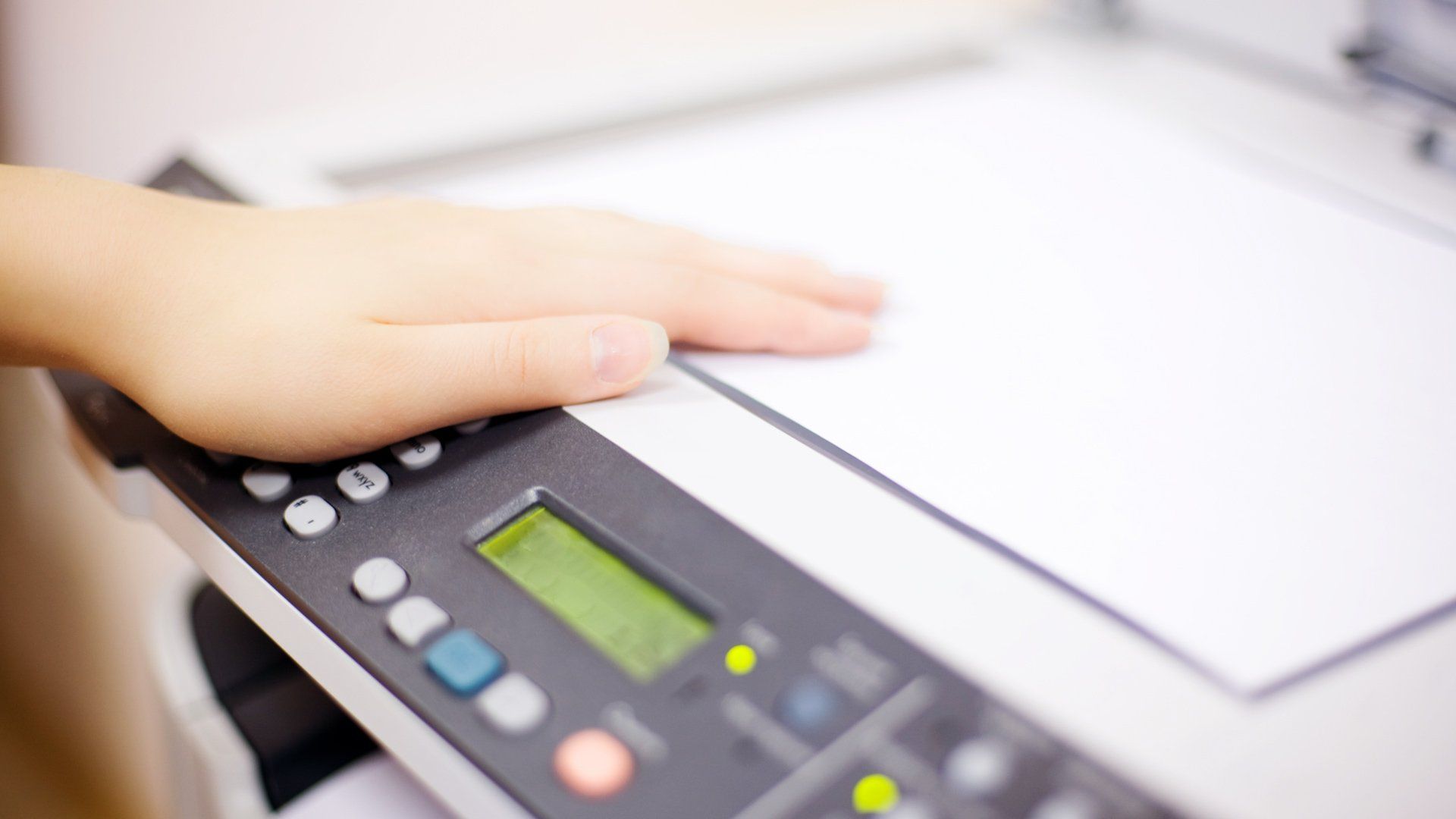 Person making copies on printer