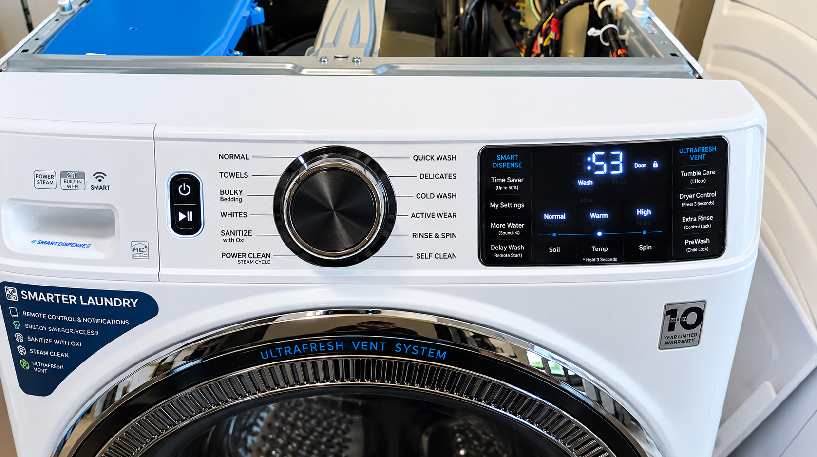 White top-load washing machine with open lid, control dial, and digital display showing 53 minutes