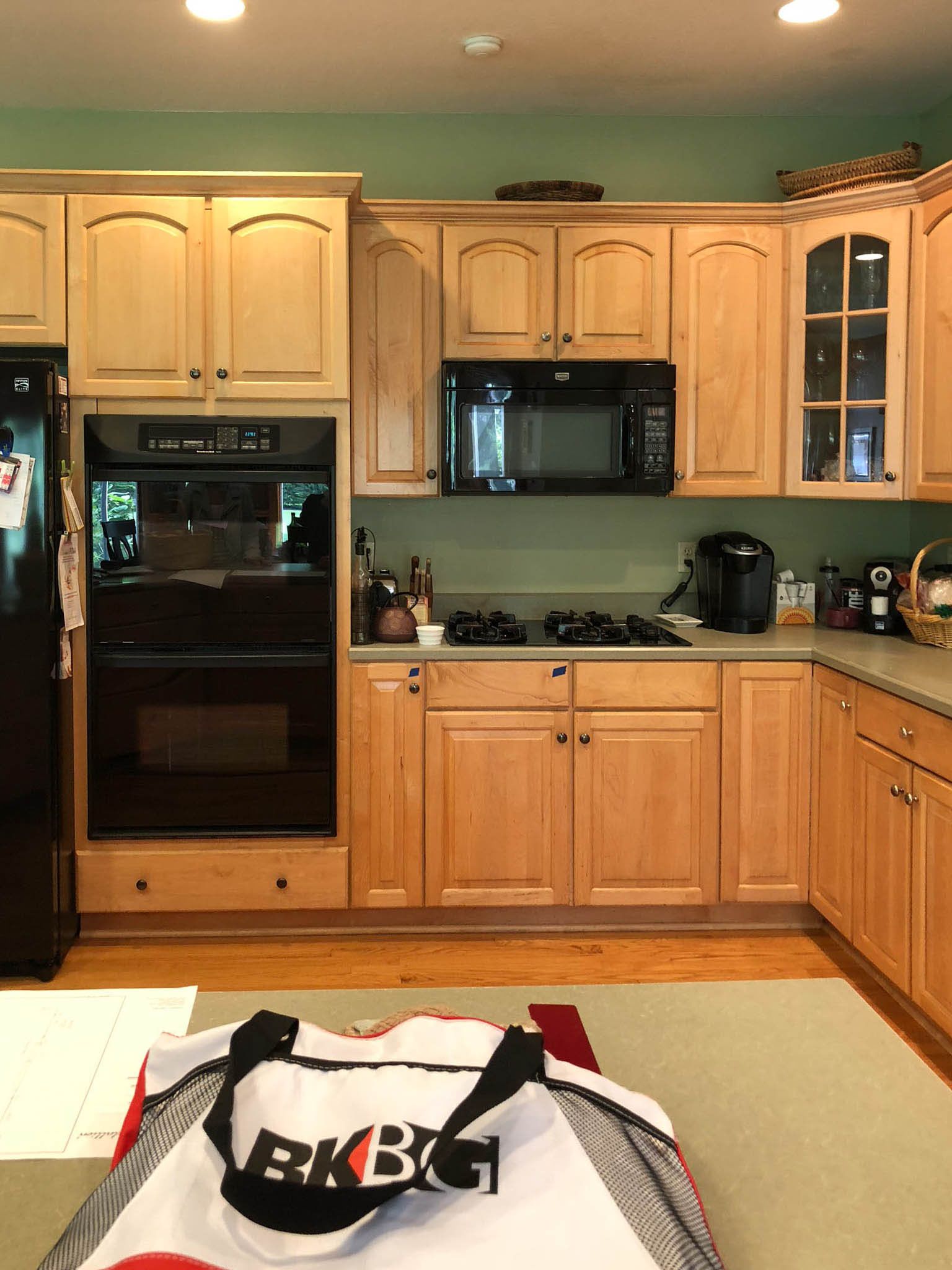 A kitchen with a bag that says bkbg on it