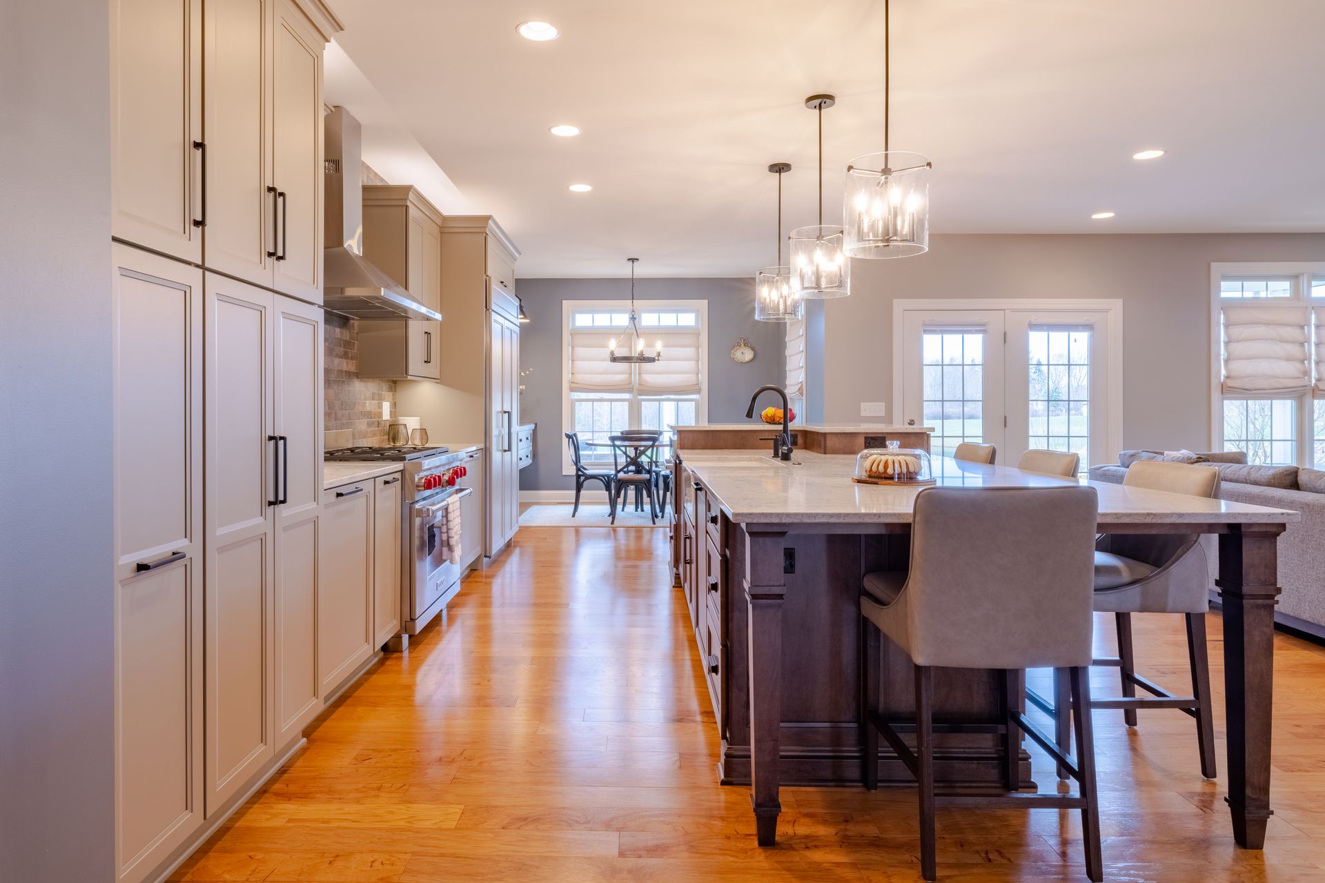 There is a large island in the middle of the kitchen.