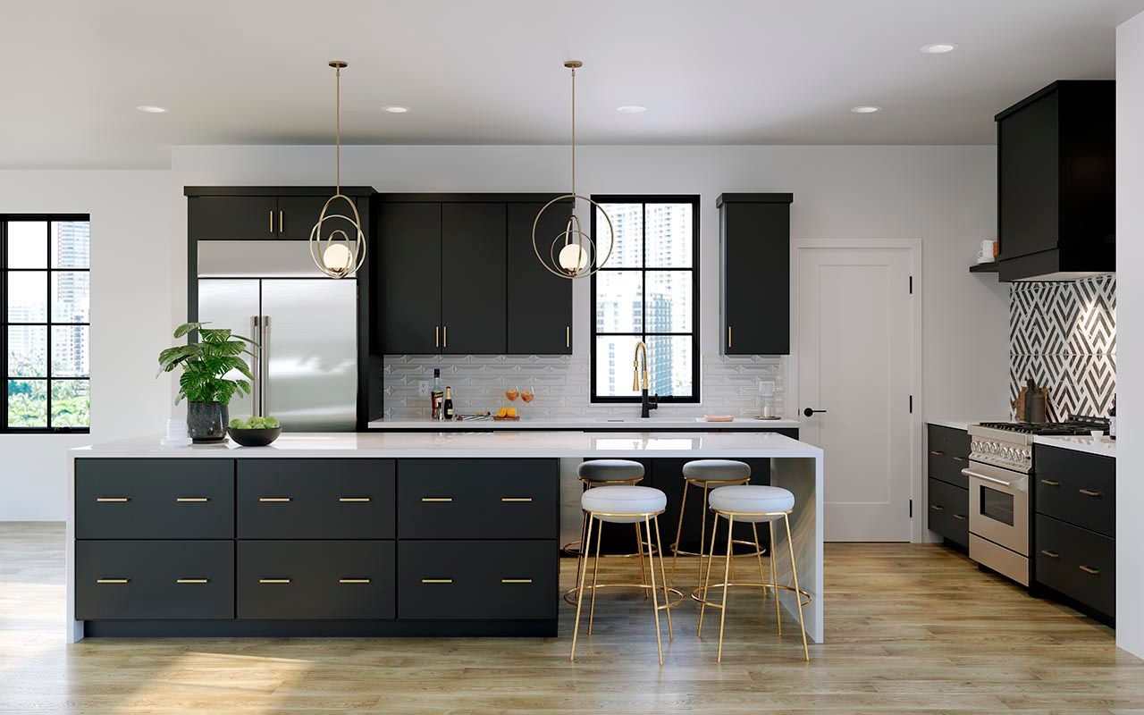 A kitchen with black cabinets , stainless steel appliances , and a large island.
