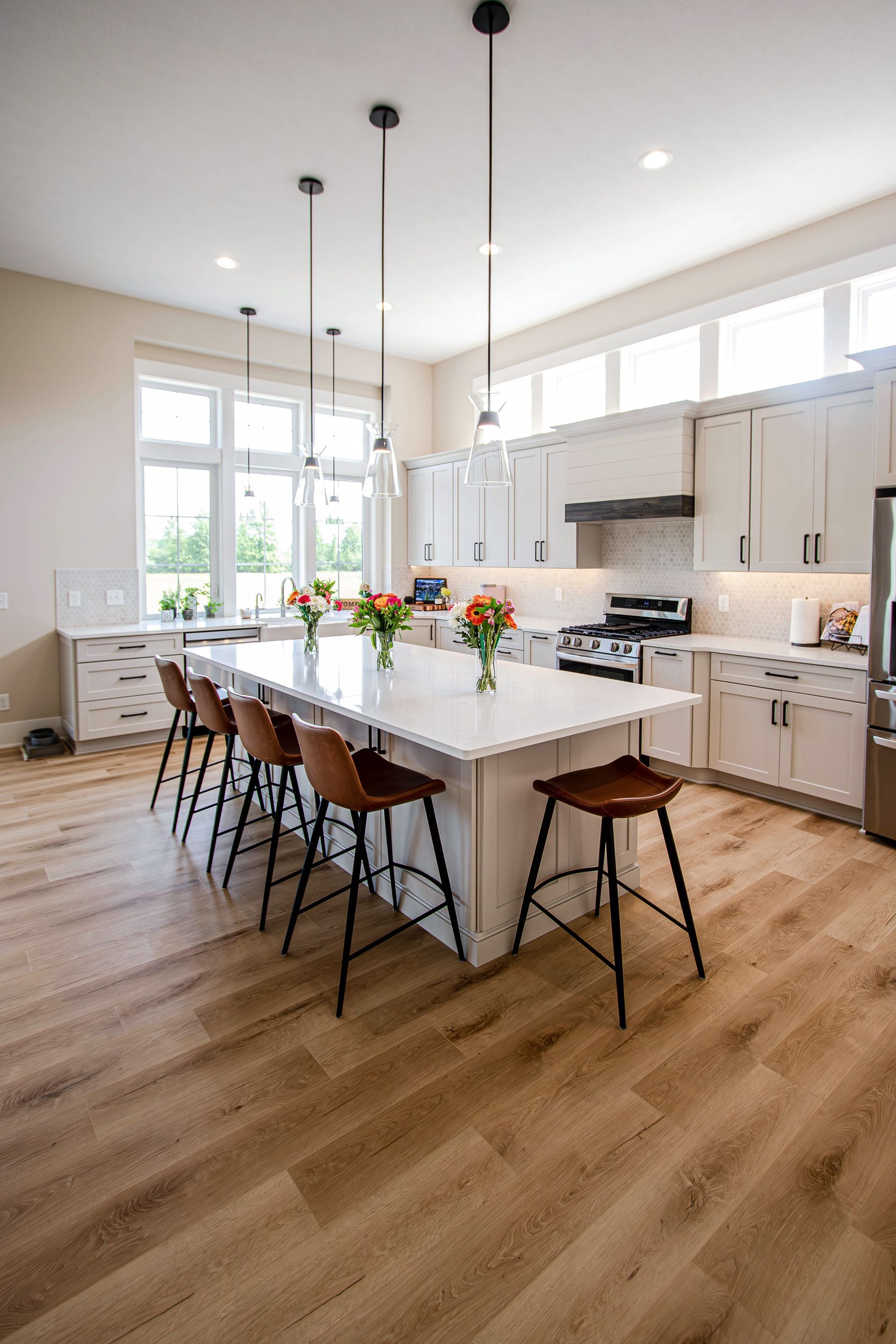 There is a large island in the middle of the kitchen.