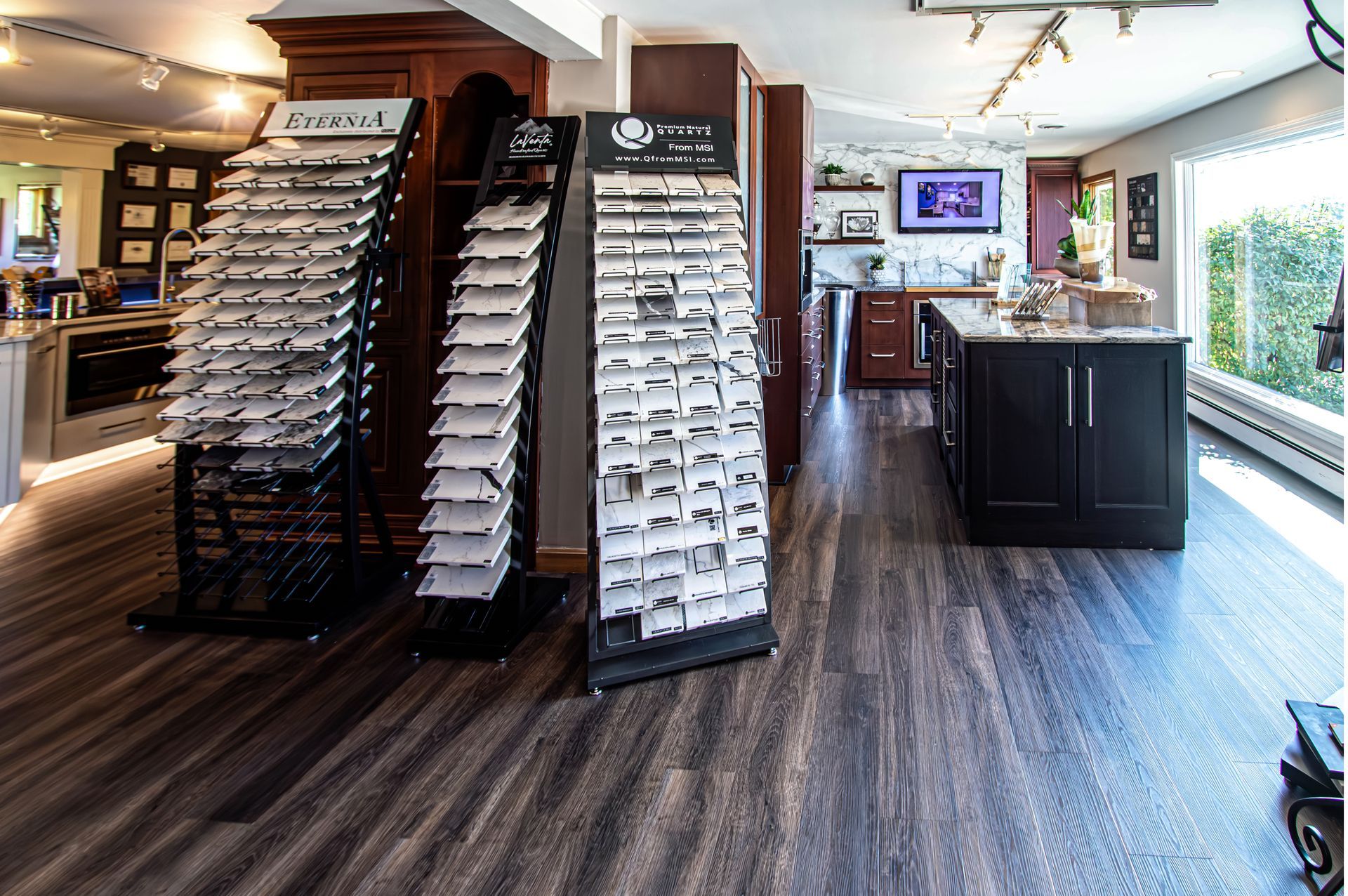 A kitchen with a lot of cabinets and a lot of displays
