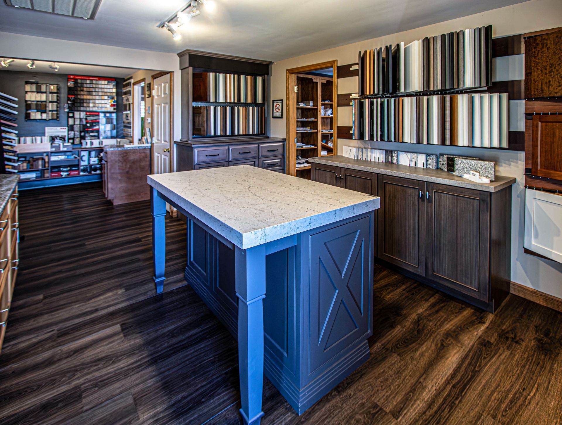 A kitchen with a large island in the middle of the room.