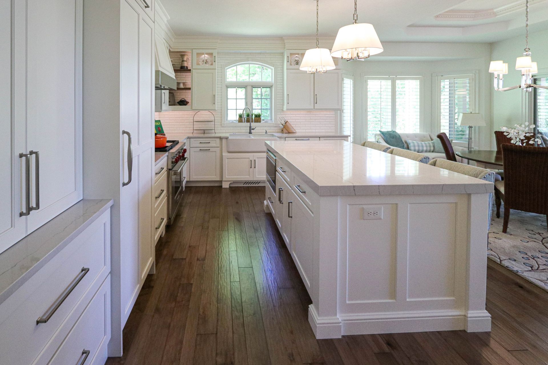 There is a large island in the middle of the kitchen.