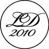 A black and white logo with the year 2010 in a circle.
