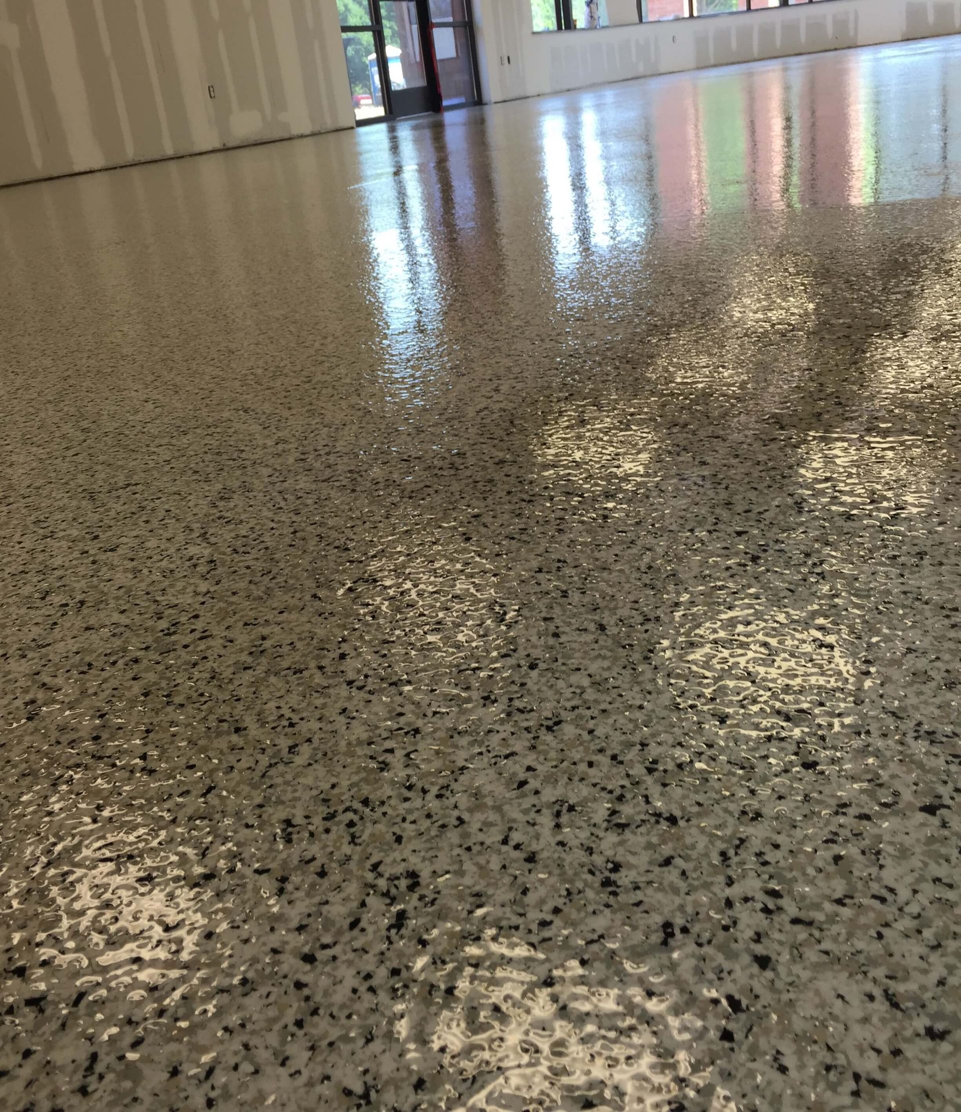 A floor with a lot of small stones on it