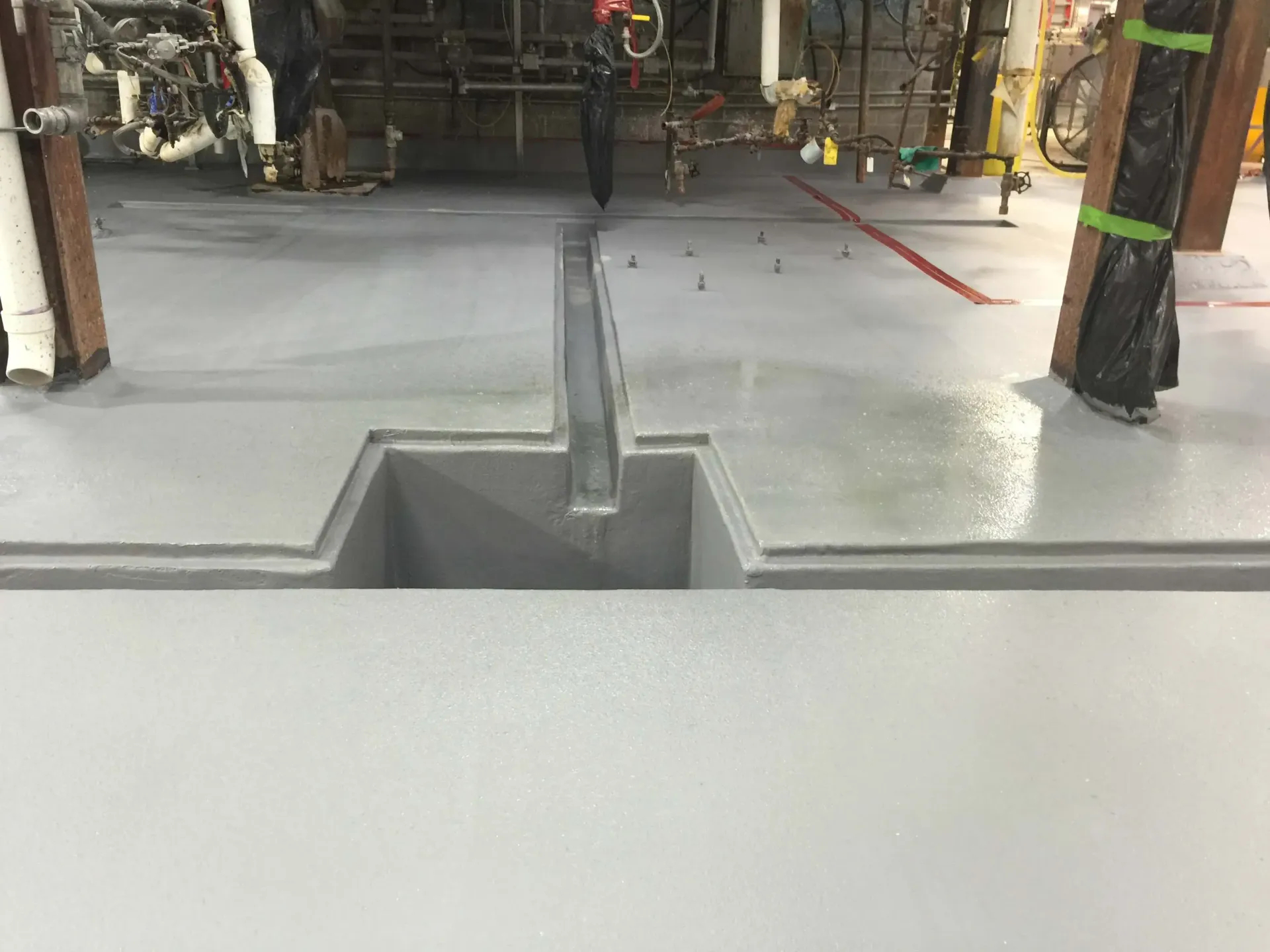 There is a hole in the floor in the middle of the room.