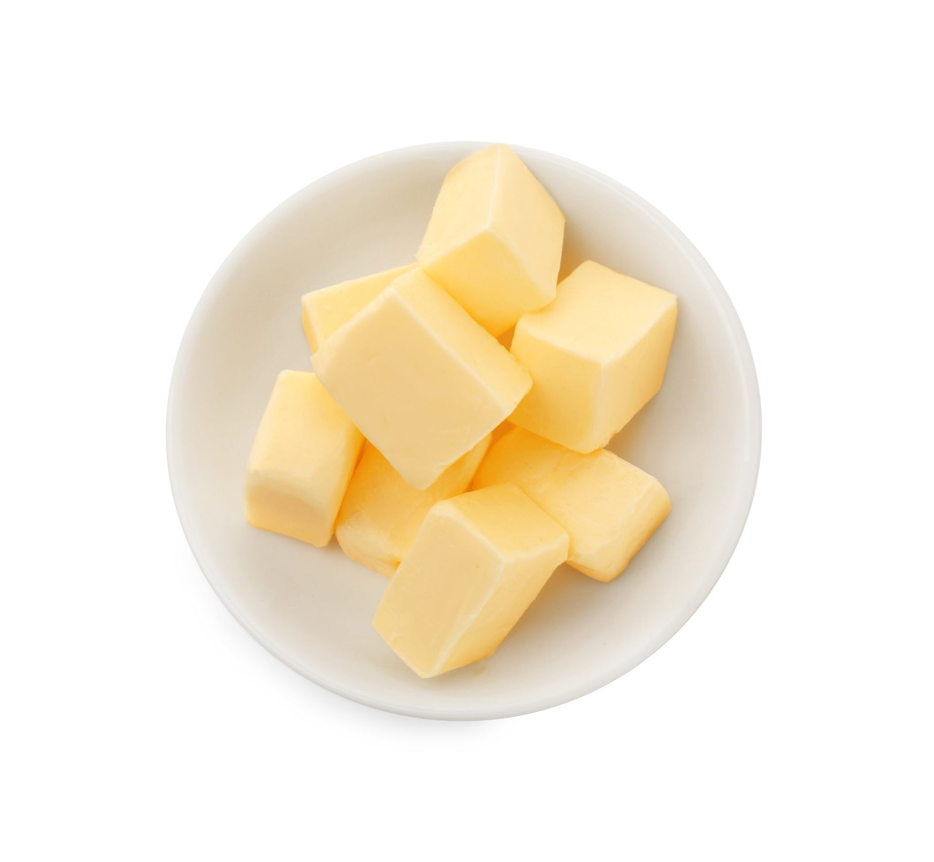 Cubed butter in a white bowl