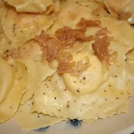Goat Cheese Ravioli w/ Caramelized Shallots and Cream Sauce