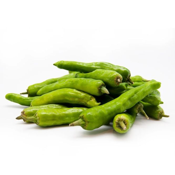 Pile of fresh green chili peppers