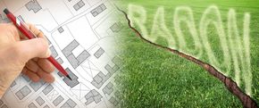 Hand drawing a house plan beside a green field with a graph line, suggesting eco-friendly building design