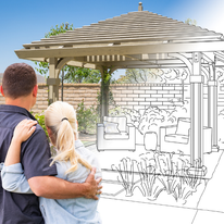 A man and woman are hugging in front of a drawing of a gazebo