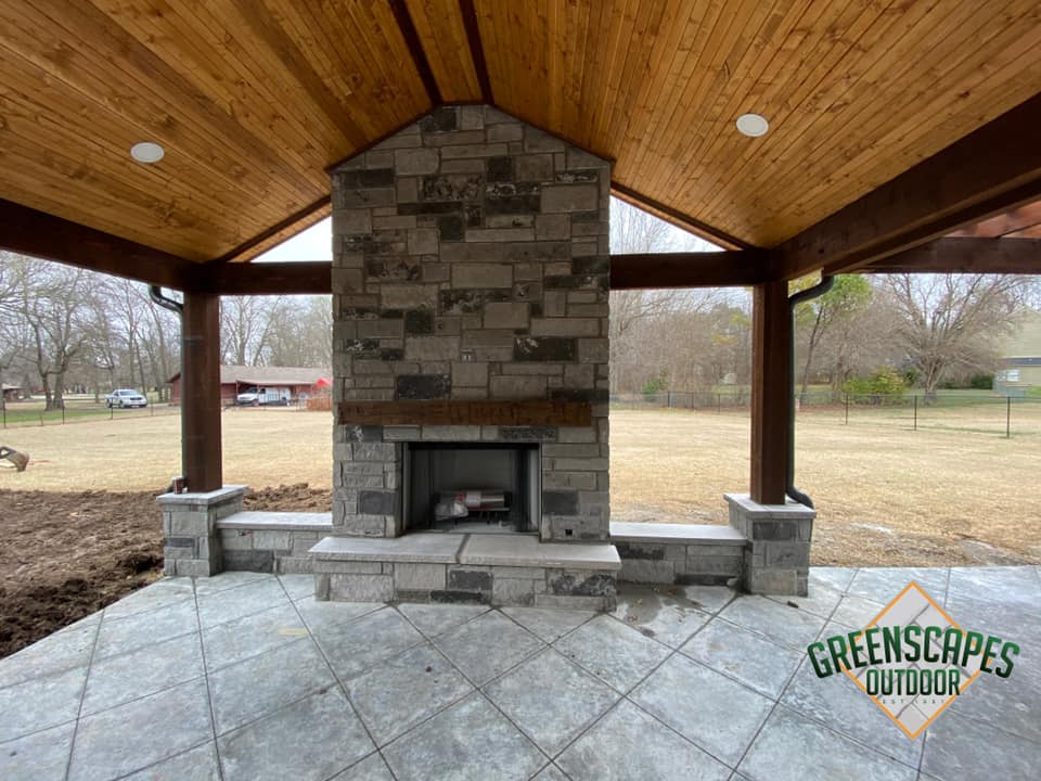 There is a fireplace in the middle of the room.