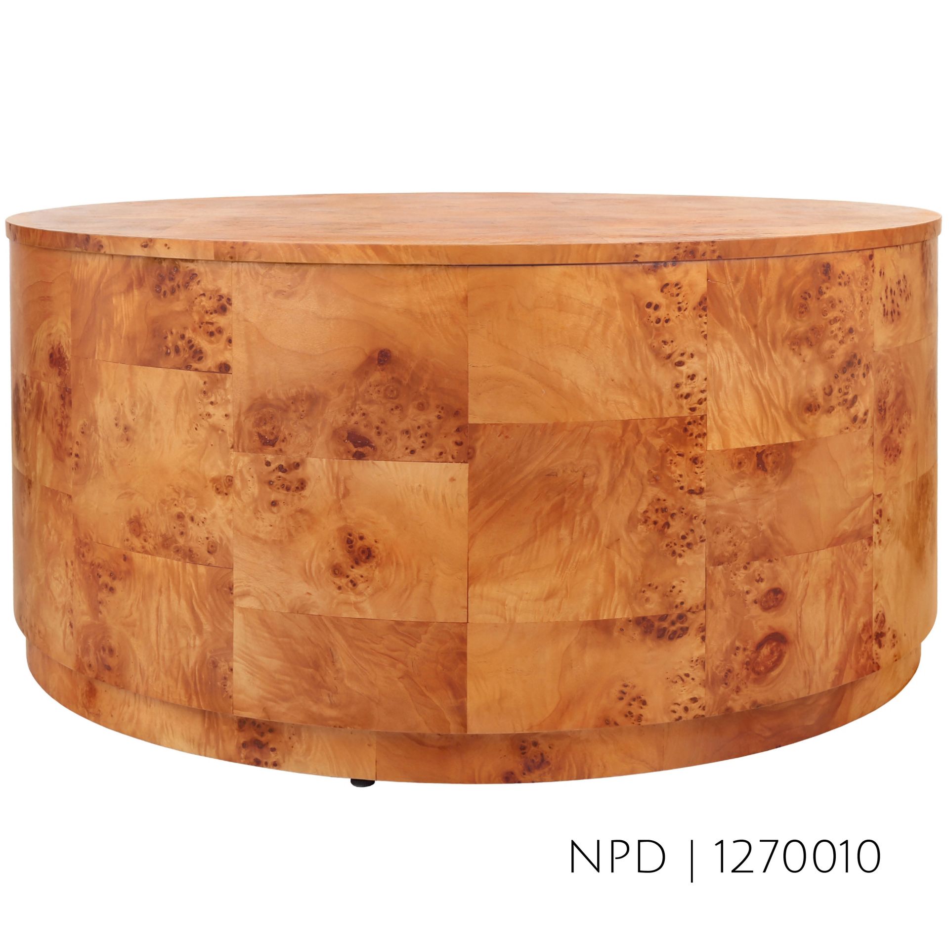 Round wooden coffee table with burled wood veneer.