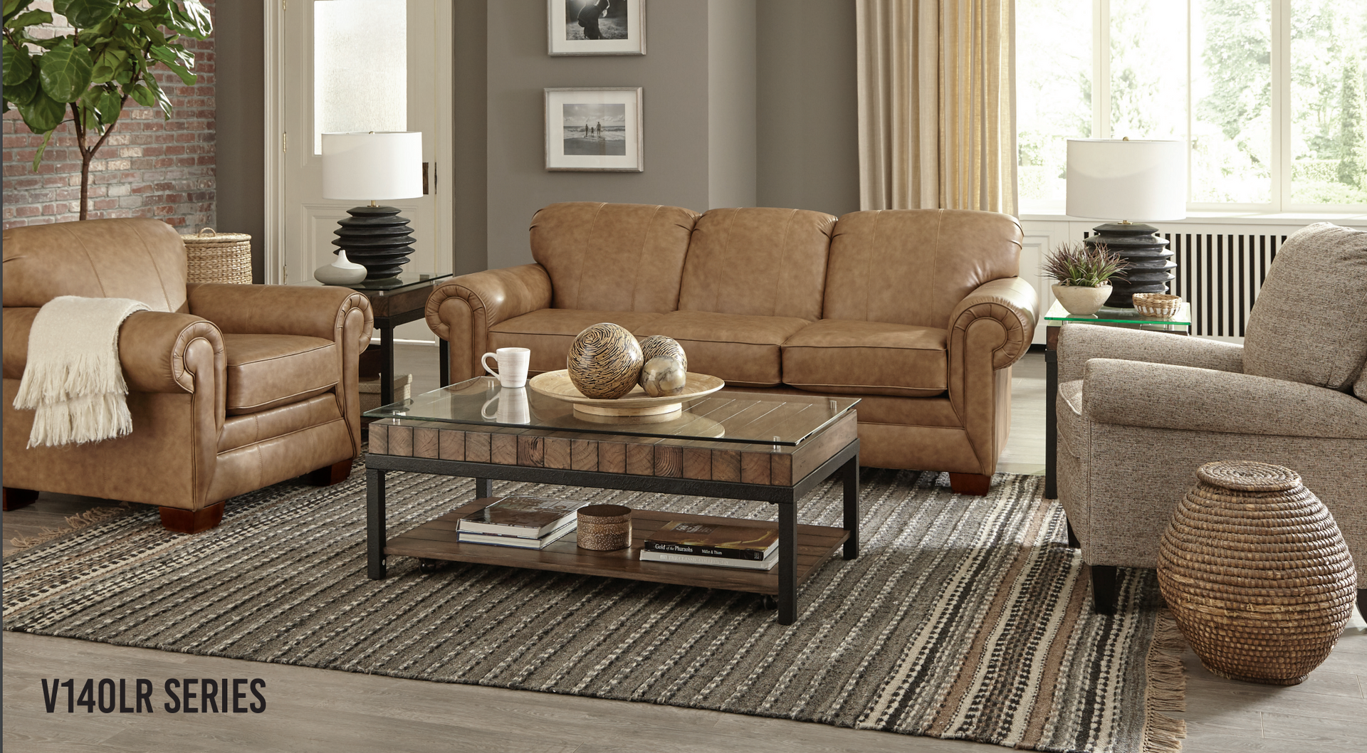 Living room furniture set with brown leather sofa, armchairs, and coffee table.