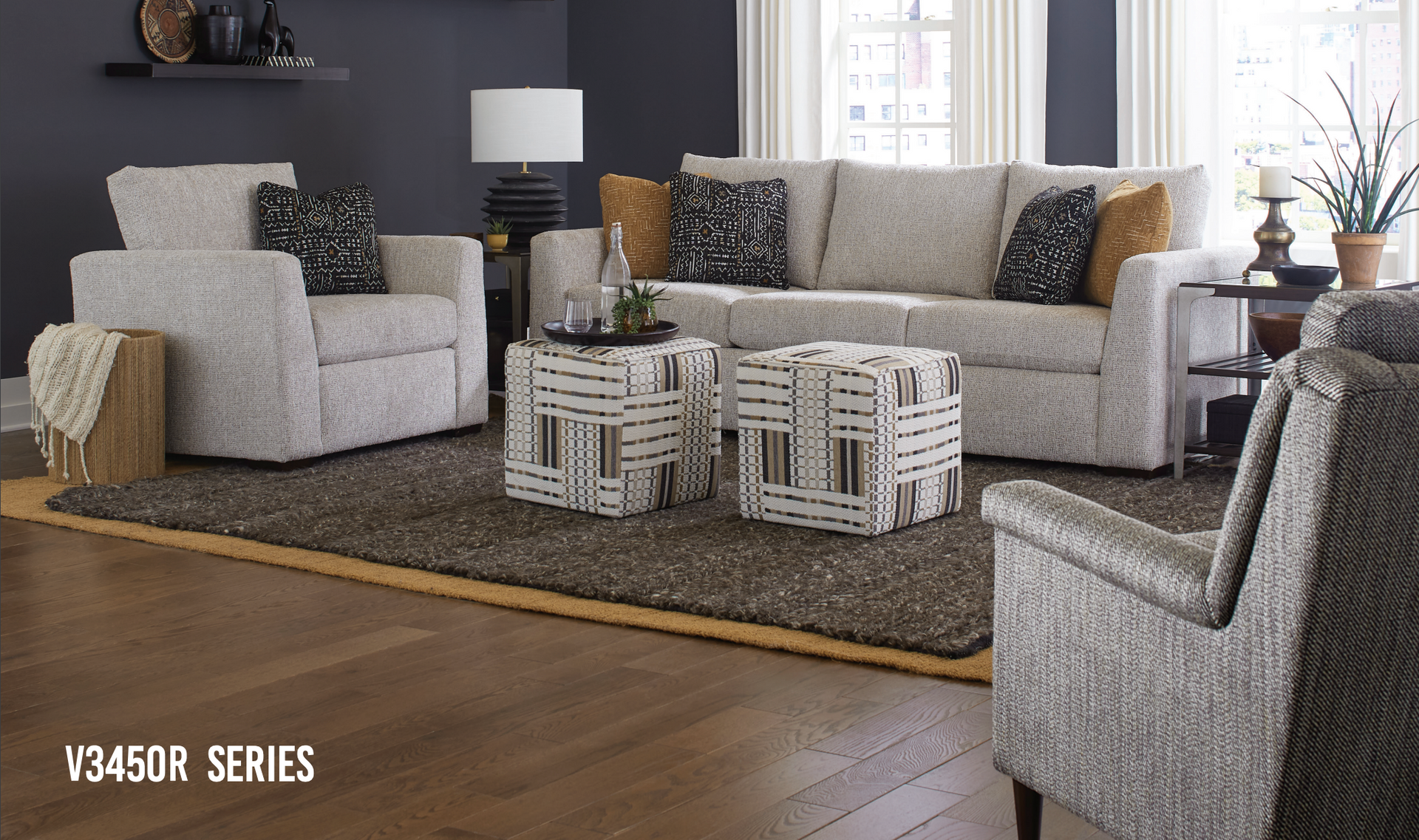 furniture set with sofa, chairs, rug, and coffee table
