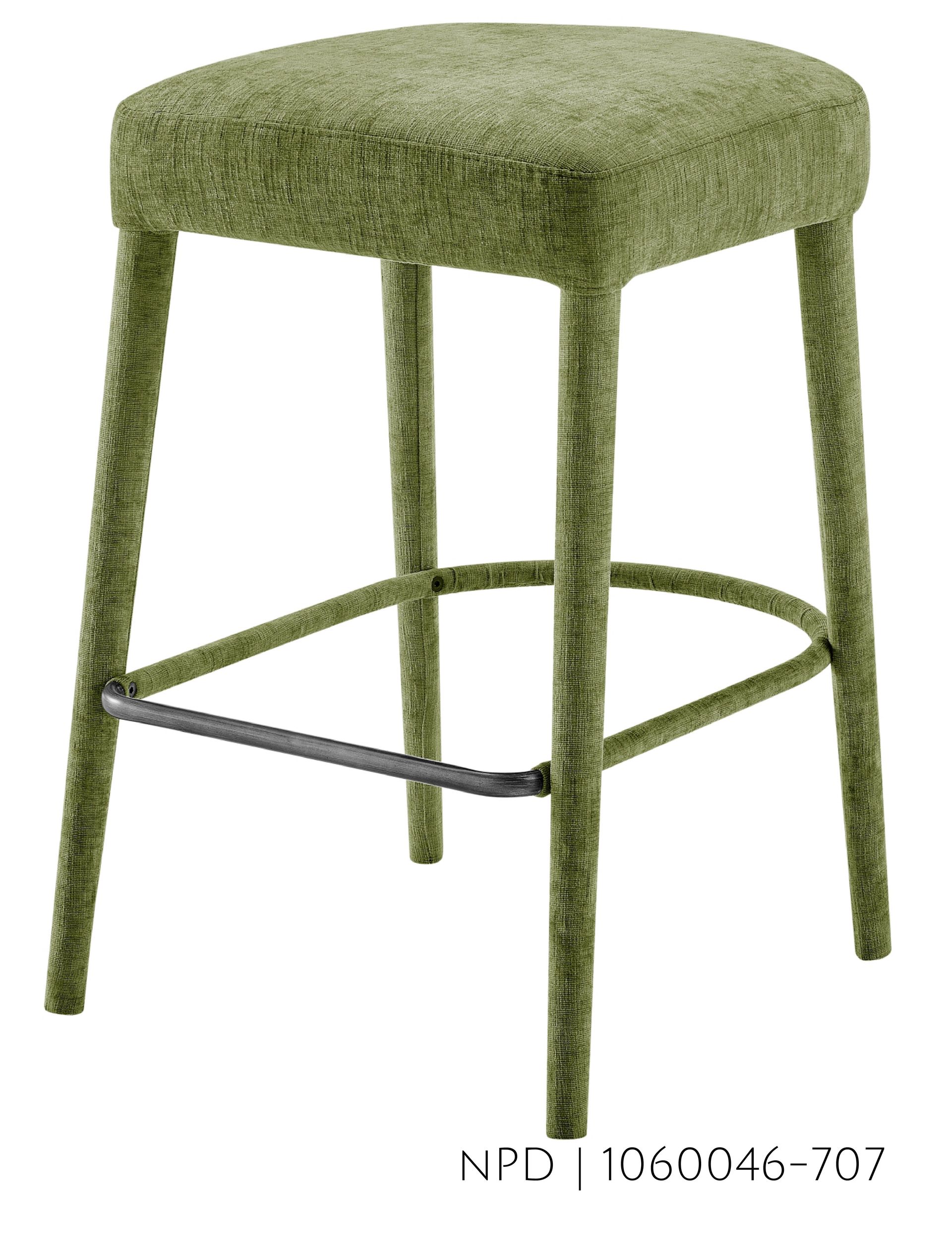Green upholstered stool with four legs and a footrest.