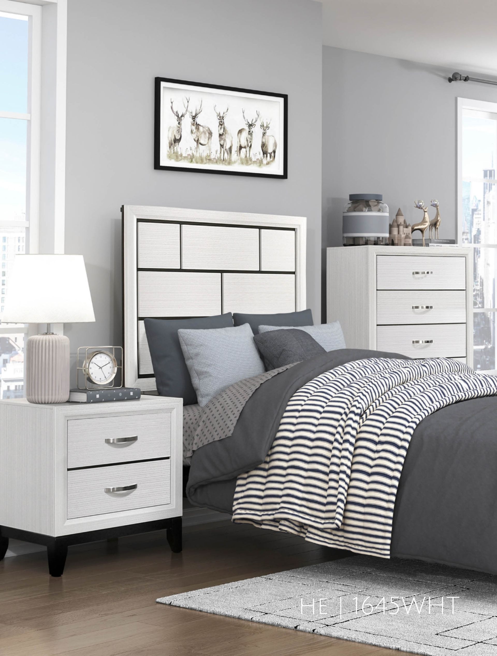 Bedroom with white and gray furniture: bed, nightstand, dresser, artwork, and bedding.