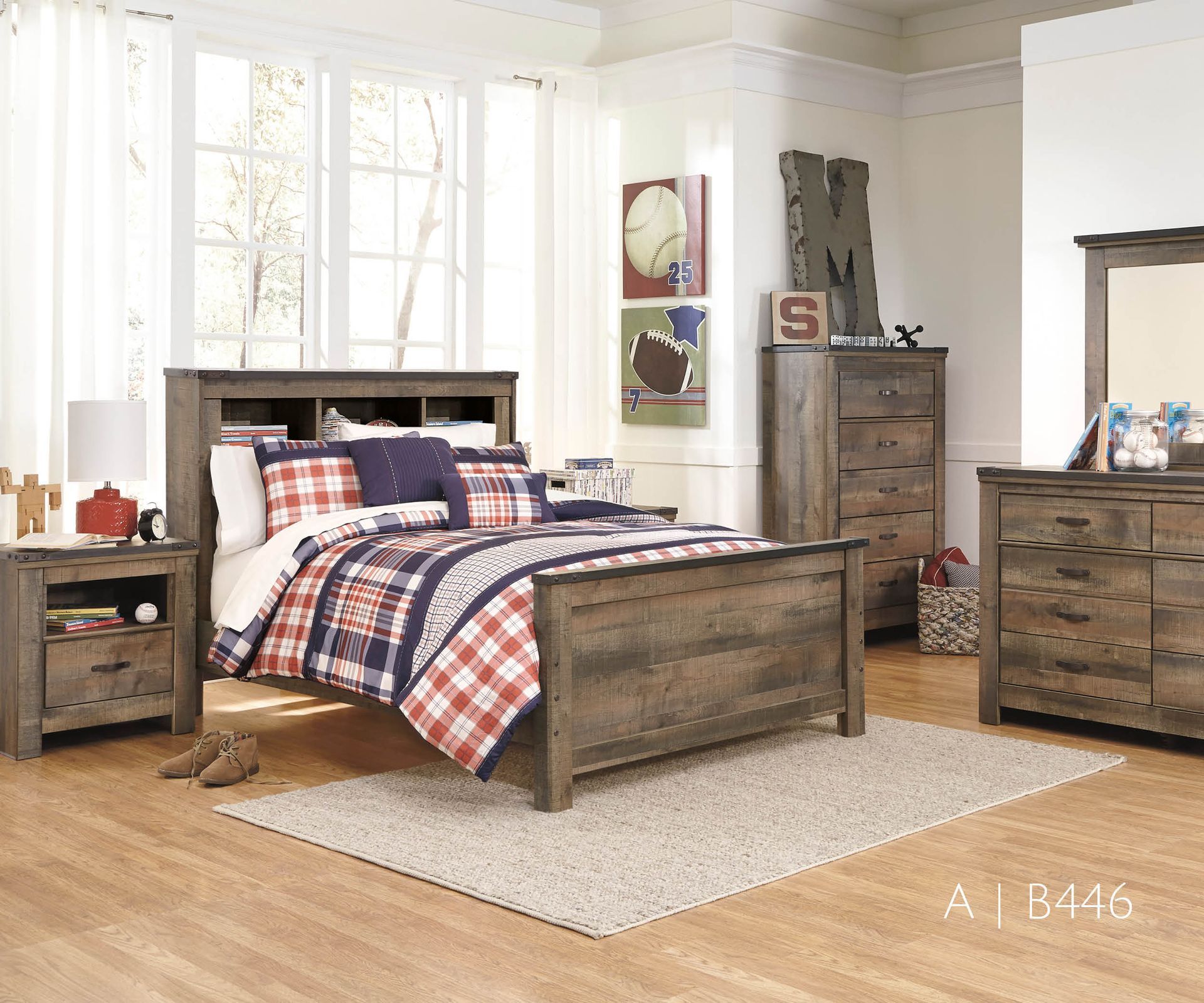 Bedroom set with a bed, dresser, nightstand, and chest of drawers.