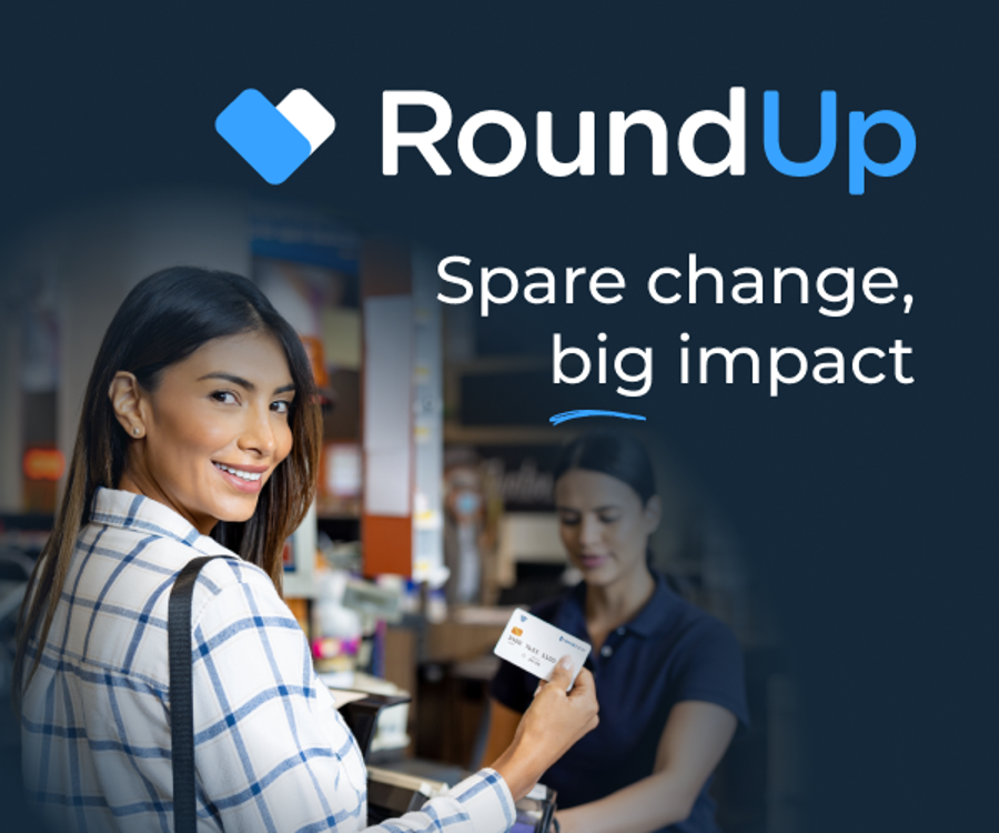 RoundUp logo over store checkout scene with text “Spare change, big impact”