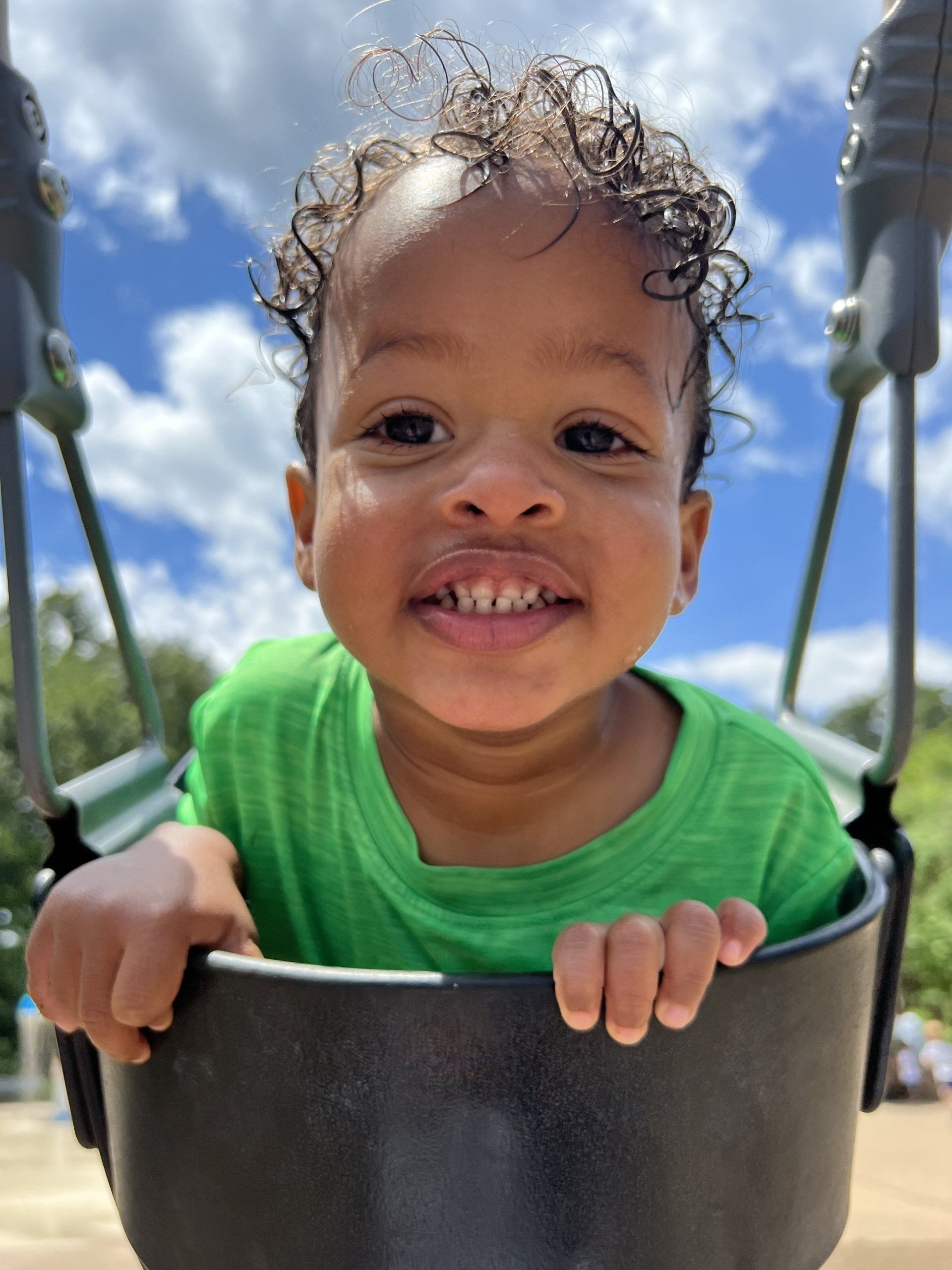 Cute Baby On Swing — Keswick, VA — Monticello Nannies Cute Baby On Swing — Keswick, VA — Monticello Nannies