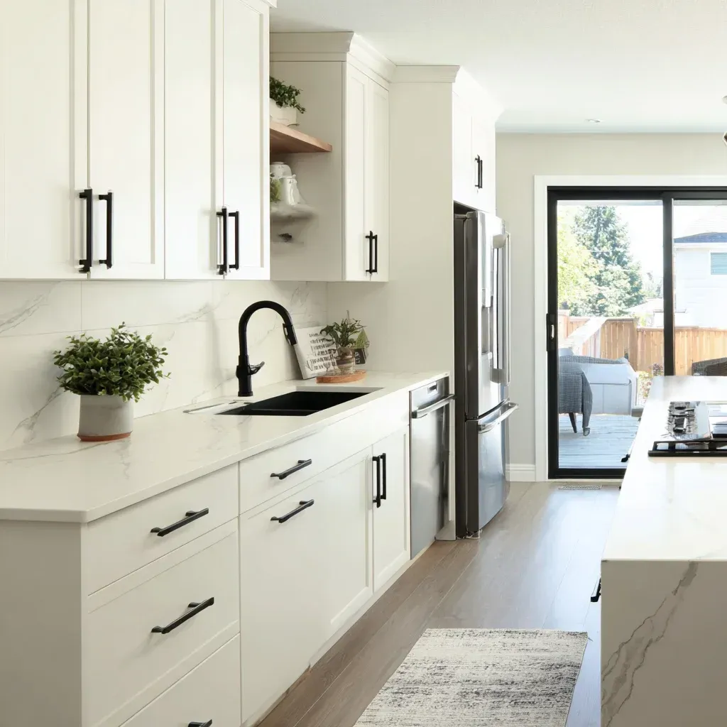 Modern Vancouver kitchen remodeling project with quartz island seating, hardwood flooring installation, and lighting system modernization.
Vancouver BC kitchen renovation services including shaker cabinet replacement, backsplash installation, and granite countertop upgrade.
High-end kitchen renovation Vancouver featuring marble waterfall island, custom millwork cabinetry, and premium appliance installation.
Full kitchen remodeling Vancouver BC including demolition, structural framing, quartz slab countertops, and hardwood flooring replacement.
Vancouver kitchen renovation displaying granite island extension, porcelain tile flooring installation, and modern cabinetry hardware upgrades.